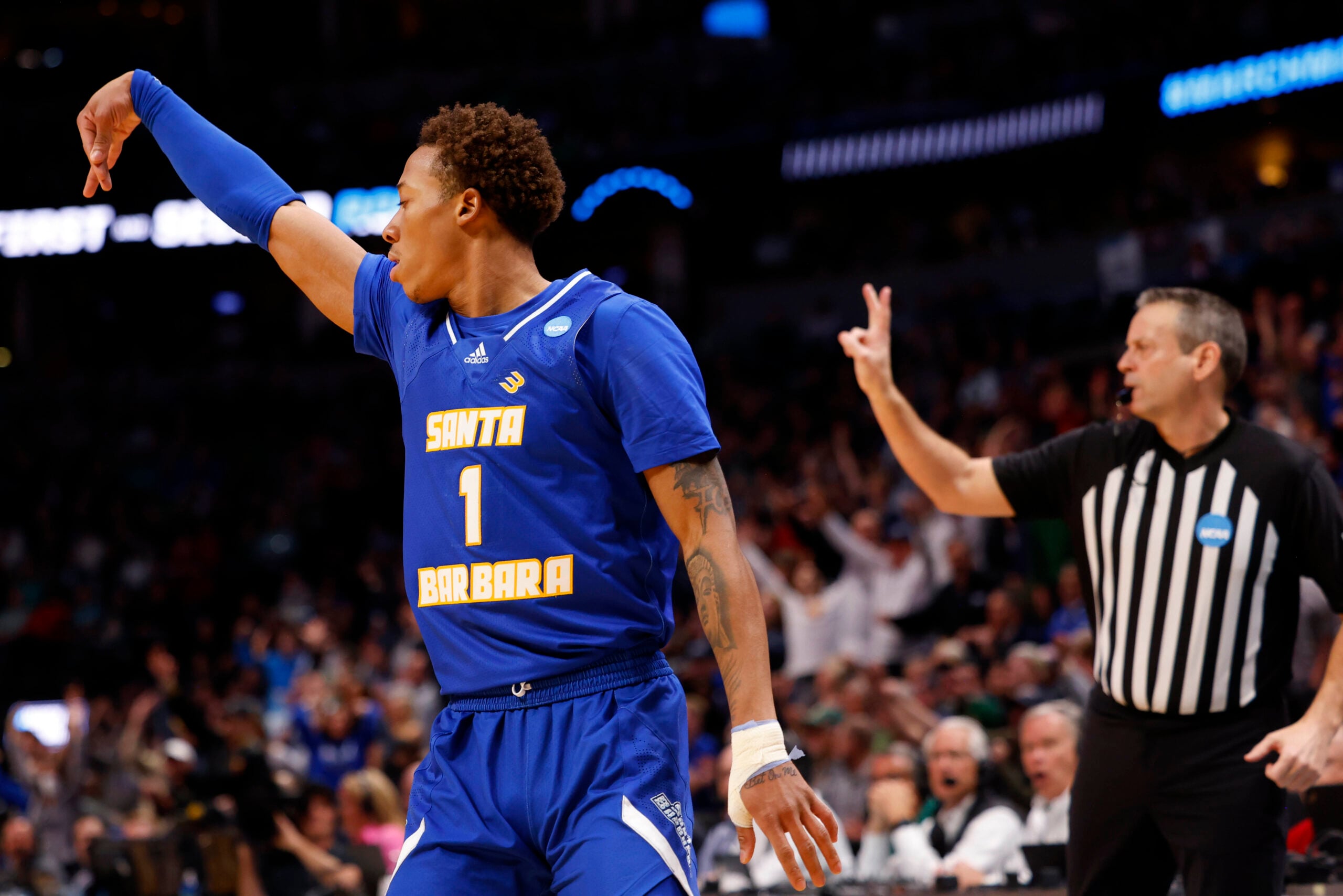 Mar 17, 2023; Denver, CO, USA;  UC Santa Barbara Gauchos guard Josh Pierre-Louis (1) celebrates after scoring a basket during the first half against Baylor Bears in the first round of the 2023 NCAA men   s basketball tournament at Ball Arena. Mandatory Credit: Michael Ciaglo-Imagn Images