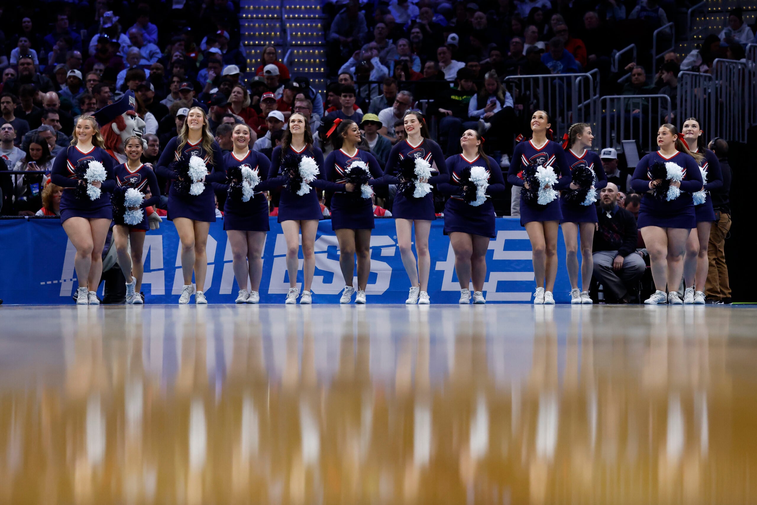 Mar 21, 2025; Cleveland, OH, USA; Robert Morris Colonials cheerleaders perform in the second half against the Alabama Crimson Tide during the NCAA Tournament First Round at Rocket Arena. Mandatory Credit: Rick Osentoski-Imagn Images
