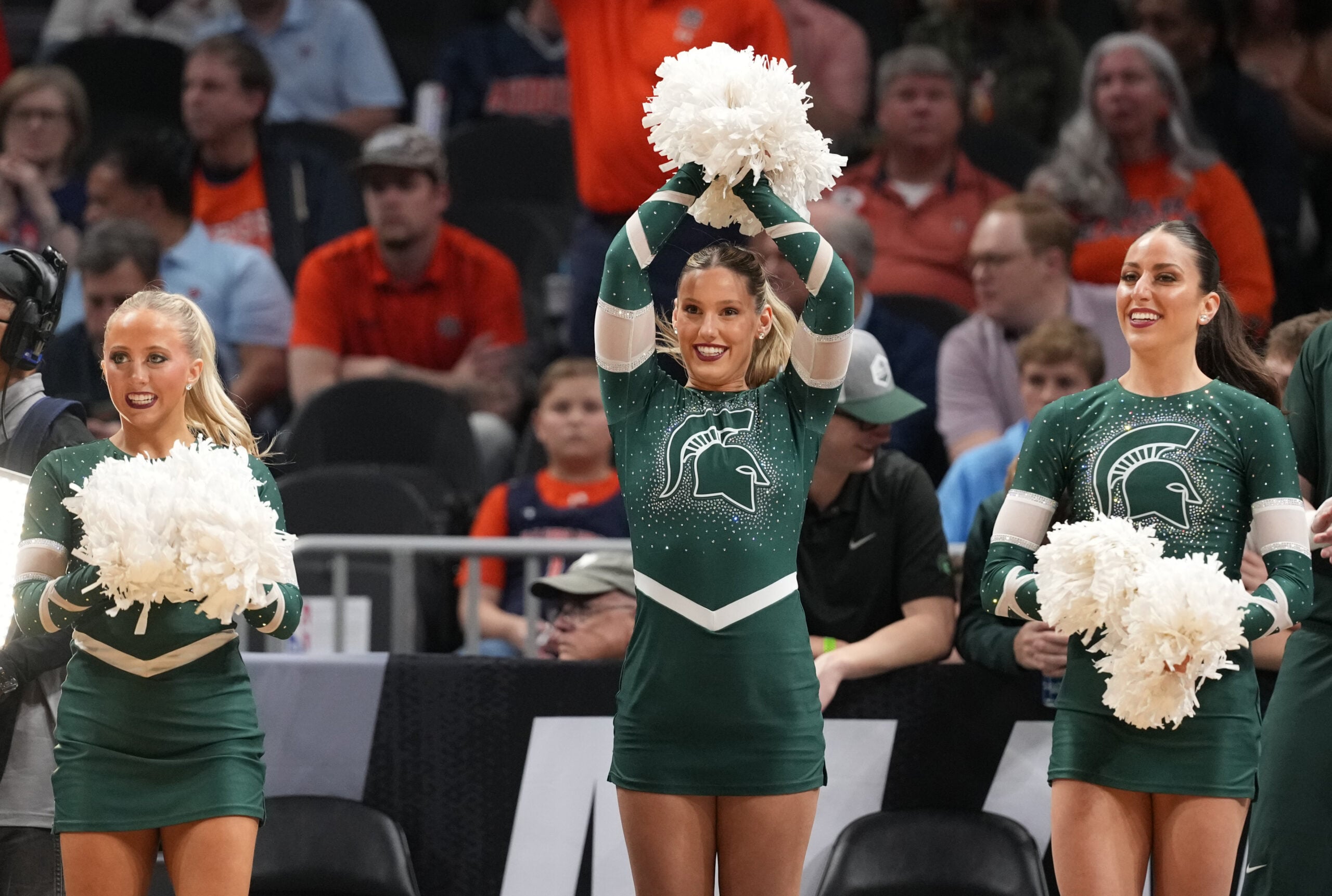 Mar 30, 2025; Atlanta, GA, USA; Michigan State Spartans cheerleaders before a South Regional final of the 2025 NCAA tournament against the Auburn Tigers at State Farm Arena. Mandatory Credit: Brett Davis-Imagn Images
