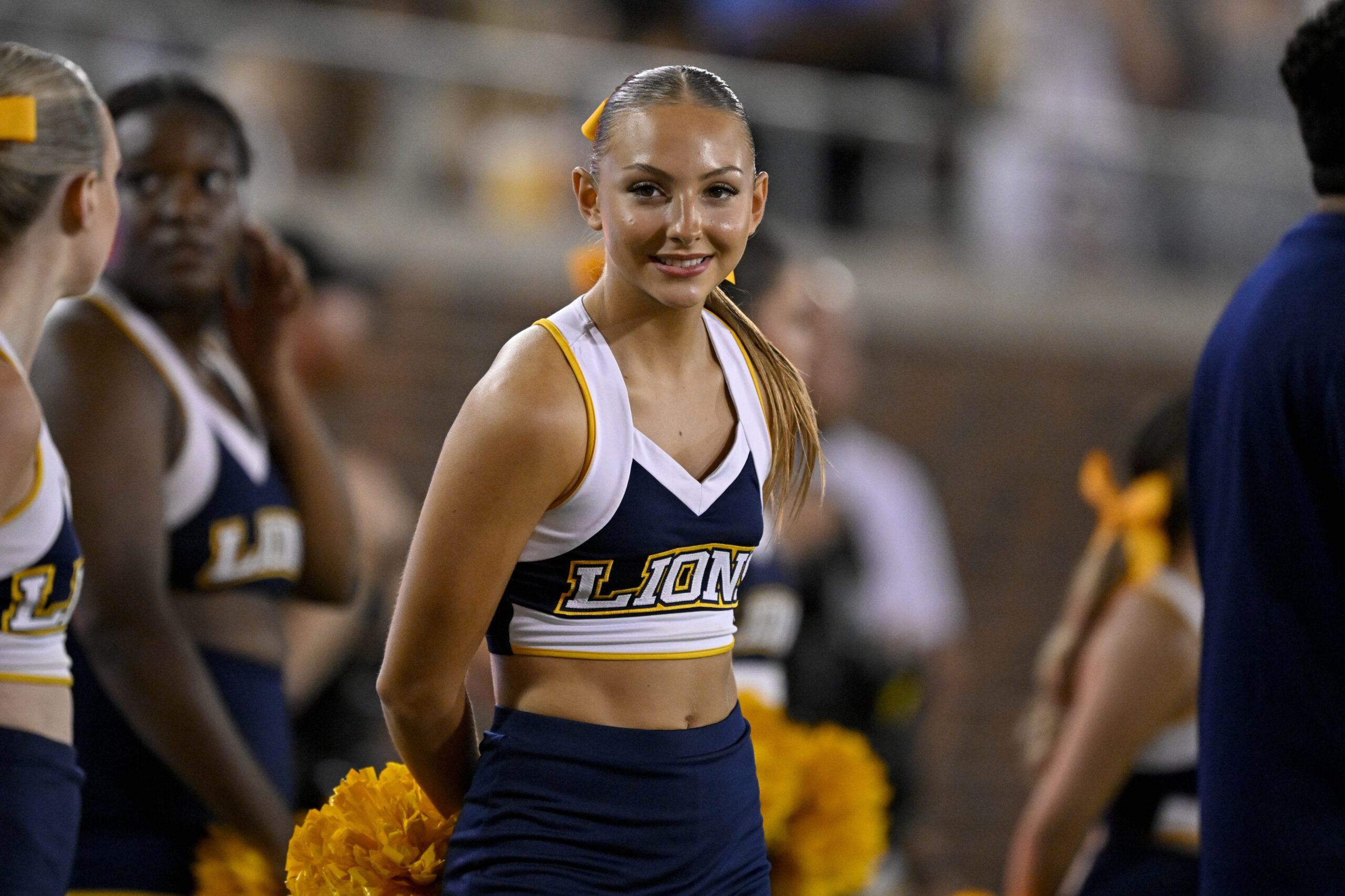 Aug 30, 2025; Dallas, Texas, USA; A East Texas A&M Lions cheerleader looks on during the second half against the Southern Methodist Mustangs at Gerald J. Ford Stadium. Mandatory Credit: Jerome Miron-Imagn Images