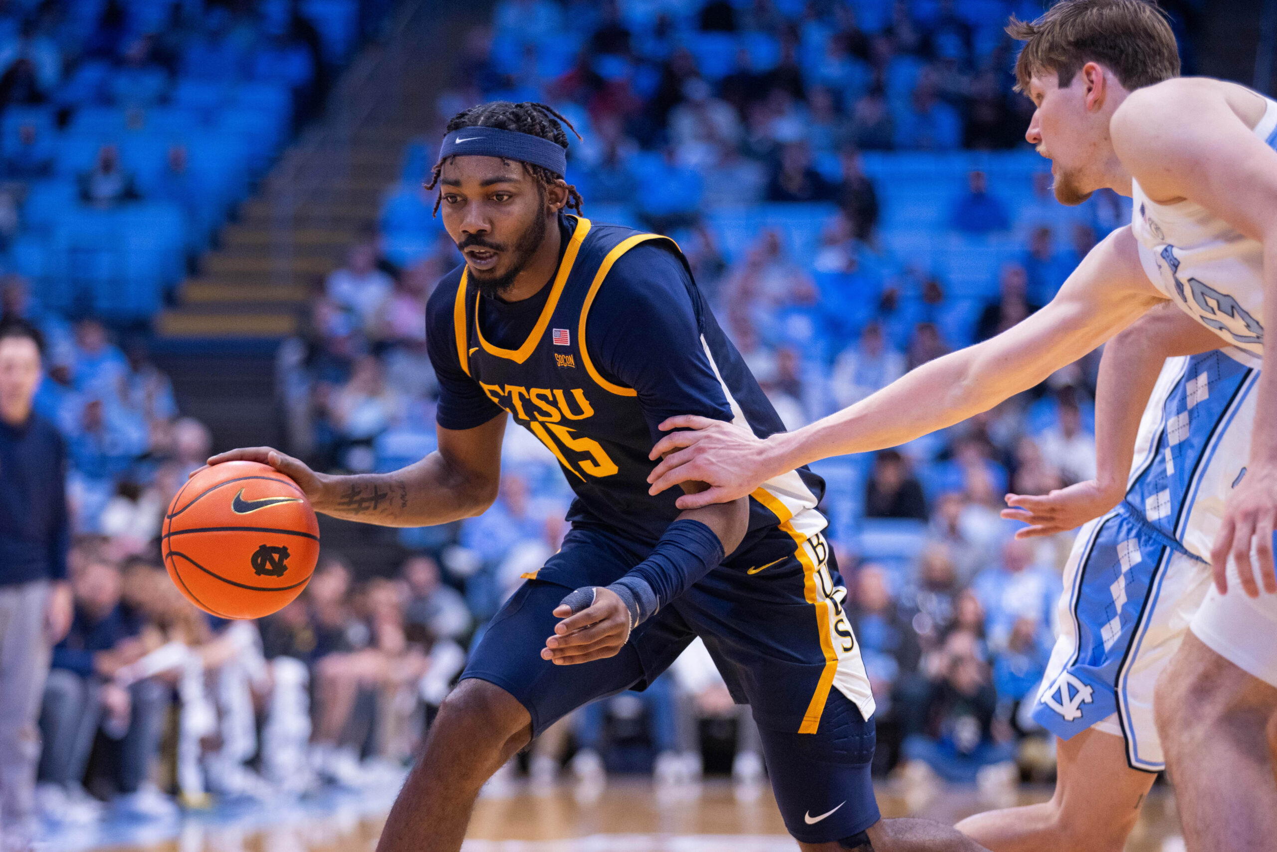 Dec 16, 2025; Chapel Hill, North Carolina, USA; ETSU Buccaneers forward Cam Morris III (15) drives with the ball during the first half against the North Carolina Tar Heels at Dean E. Smith Center. Mandatory Credit: Scott Kinser-Imagn Images