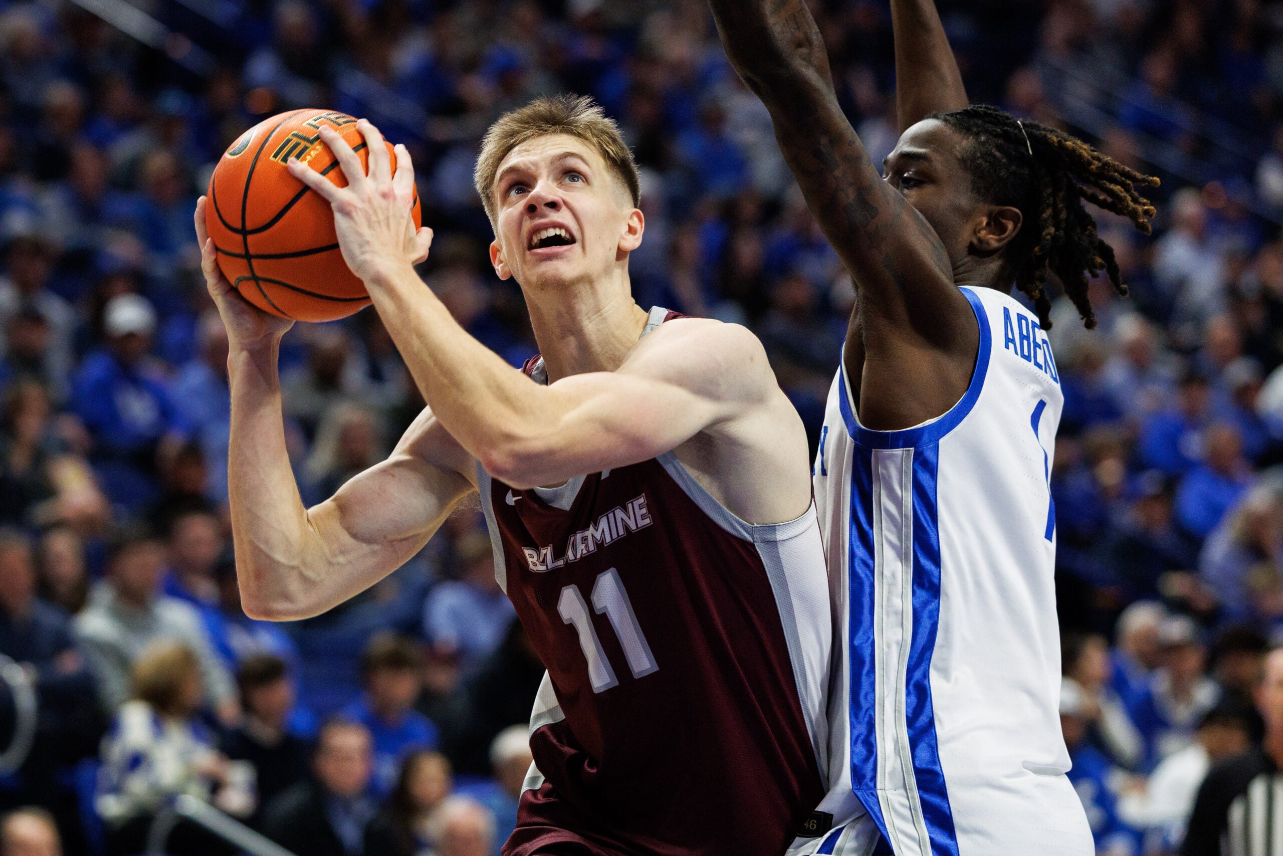 Dec 23, 2025; Lexington, Kentucky, USA; Bellarmine Knights forward Brian Waddell (11) takes the ball to the basket against Kentucky Wildcats guard Denzel Aberdeen (1) during the first half at Rupp Arena at Central Bank Center. Mandatory Credit: Jordan Prather-Imagn Images