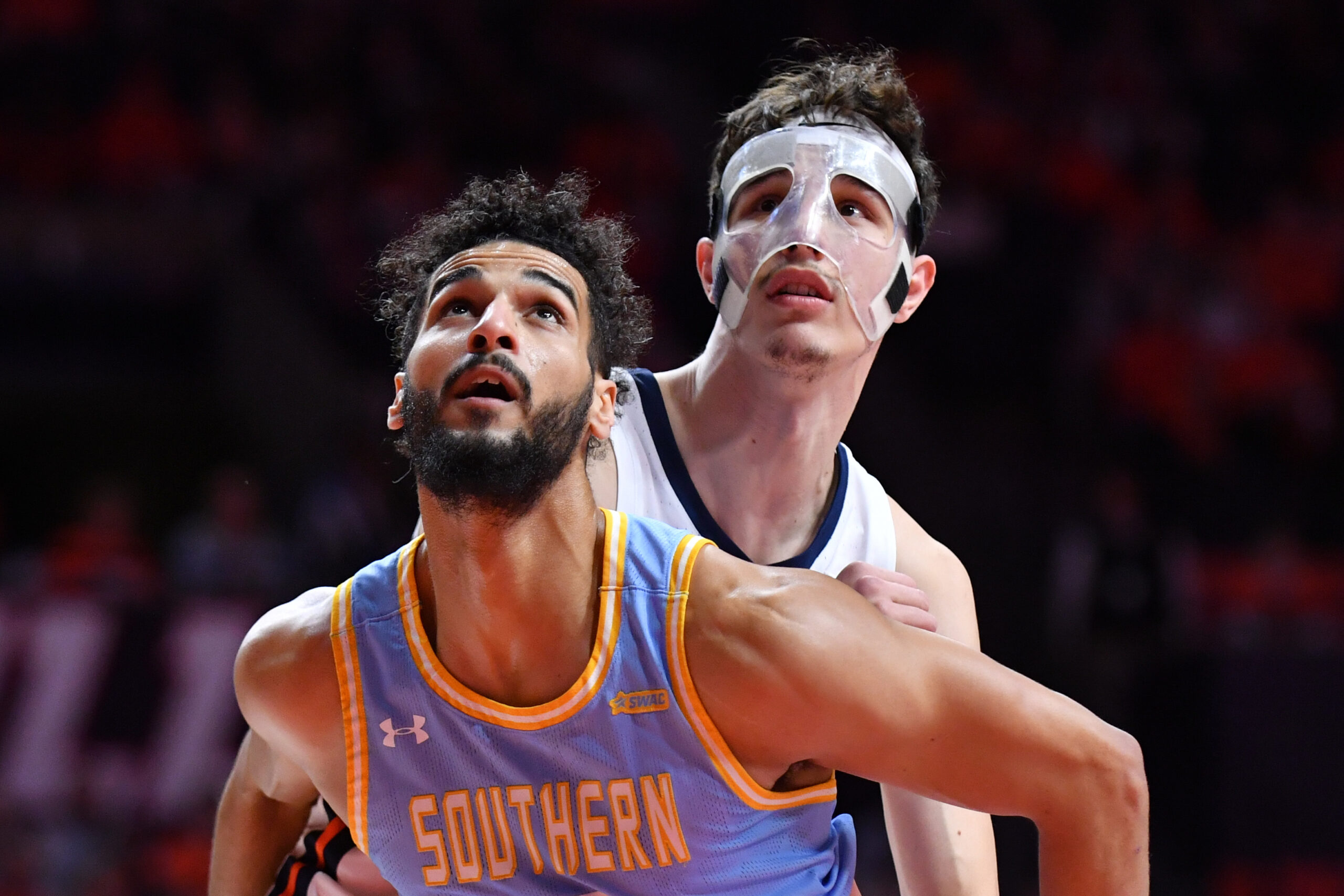Dec 29, 2025; Champaign, Illinois, USA;  Illinois Fighting Illini forward Zvonimir Ivisic (back) and Southern University Jaguars forward Malek Abdelgowad (8) wait for a rebound during the first half at State Farm Center. Mandatory Credit: Ron Johnson-Imagn Images