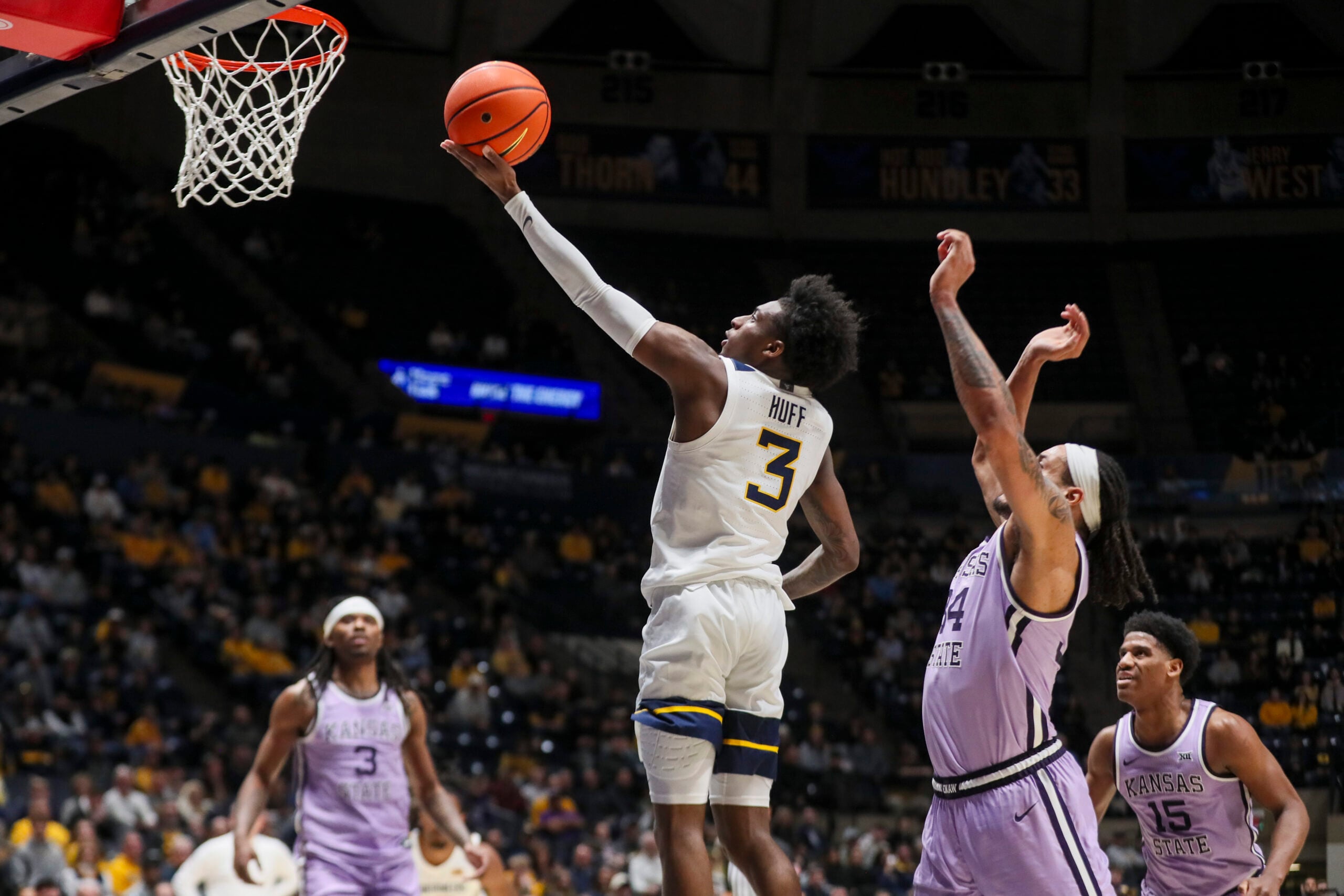 Jan 27, 2026; Morgantown, West Virginia, USA; West Virginia Mountaineers guard Honor Huff (3) drives down the lane and shoots during the second half against the Kansas State Wildcats at Hope Coliseum. Mandatory Credit: Ben Queen-Imagn Imagesa