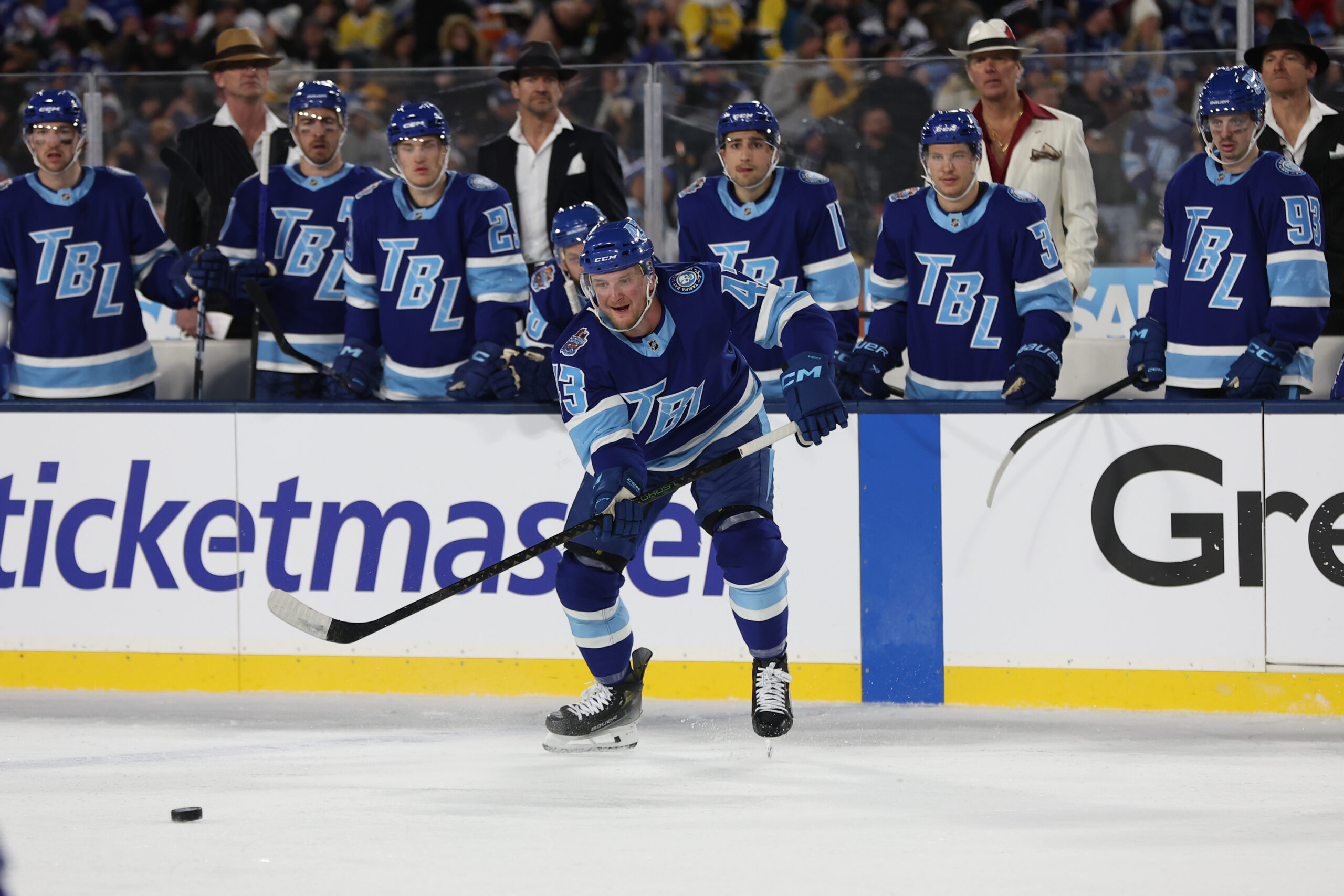Feb 1, 2026; Tampa Bay, Florida, USA; Tampa Bay Lightning defenseman Darren Raddysh (43) looks to controls the loose puck against the Boston Bruins during the second period in the 2026 Stadium Series ice hockey game at Raymond James Stadium. Mandatory Credit: Kim Klement Neitzel-Imagn Images