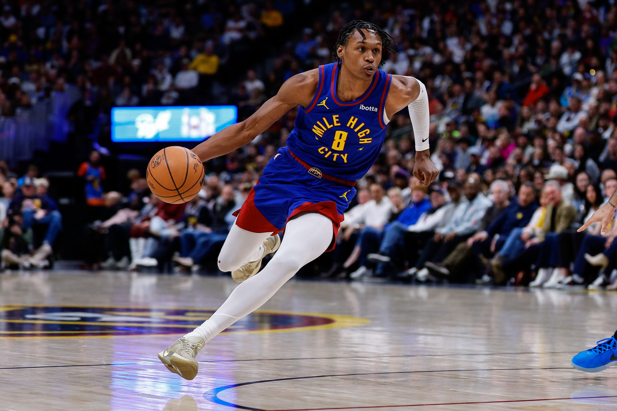 Feb 1, 2026; Denver, Colorado, USA; Denver Nuggets guard Peyton Watson (8) controls the ball in the third quarter against the Oklahoma City Thunder at Ball Arena. Mandatory Credit: Isaiah J. Downing-Imagn Images
