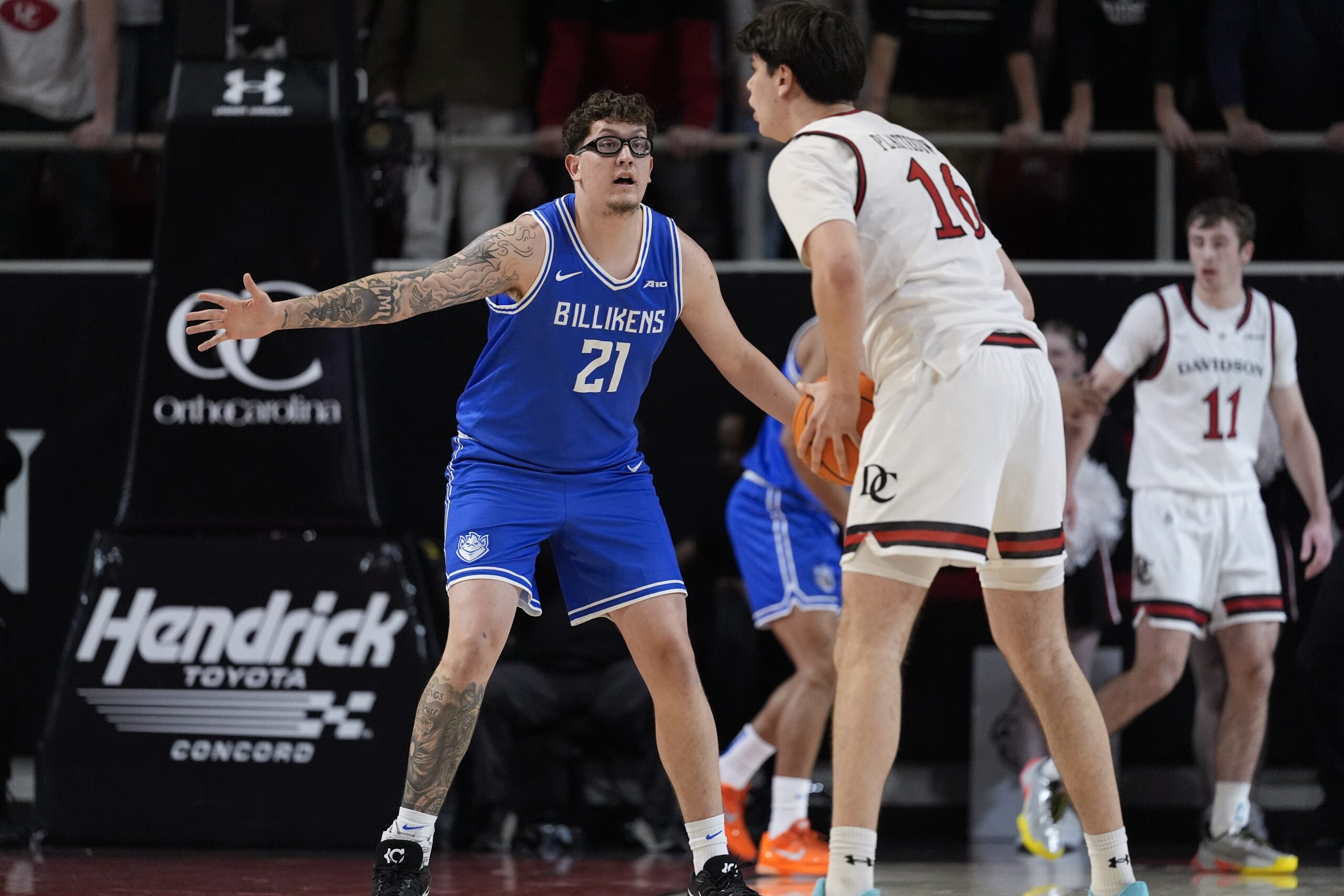 Feb 3, 2026; Davidson, North Carolina, USA; Davidson Wildcats forward Ian Platteeuw (16) sets the play defended by Saint Louis Billikens center Robbie Avila (21) during the first half at McKillop Court at John M. Belk Arena. Mandatory Credit: Jim Dedmon-Imagn Images