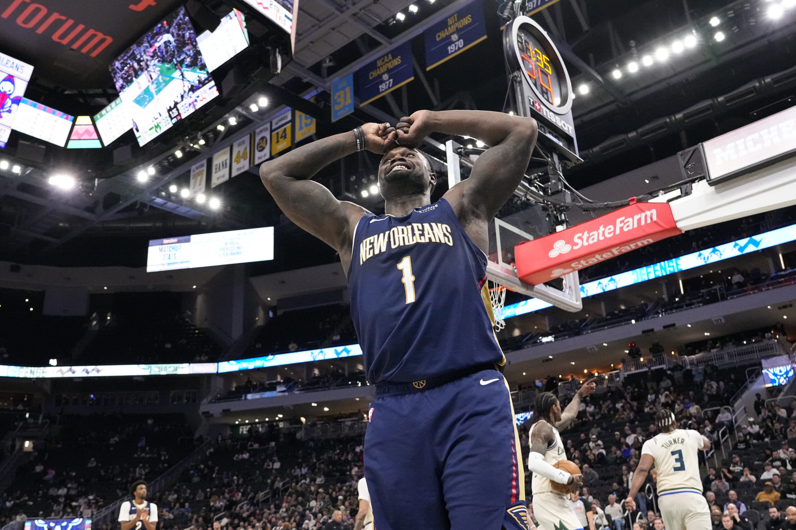 Feb 4, 2026; Milwaukee, Wisconsin, USA; New Orleans Pelicans forward Zion Williamson (1) reacts to a call during overtime against the Milwaukee Bucks at Fiserv Forum. Mandatory Credit: Jeff Hanisch-Imagn Images