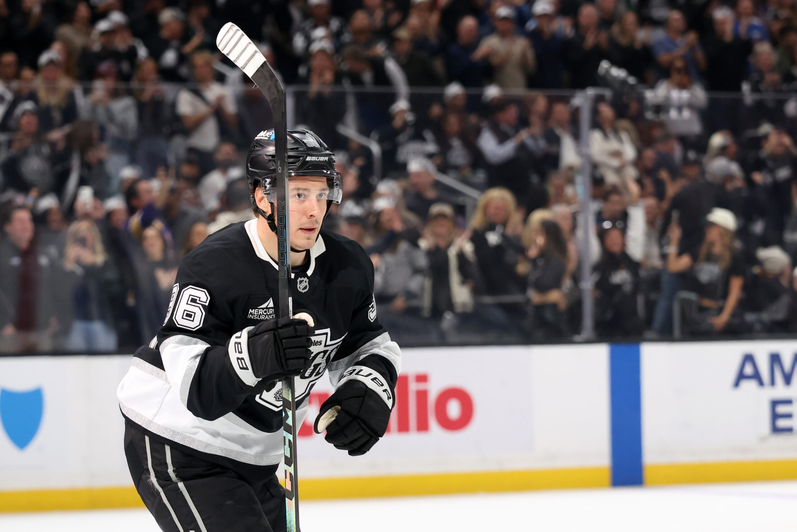 Feb 4, 2026; Los Angeles, California, USA;  Los Angeles Kings left wing Andrei Kuzmenko (96) skates back to the bench after scoring a goal during the second period against the Seattle Kraken at Crypto.com Arena. Mandatory Credit: Kiyoshi Mio-Imagn Images