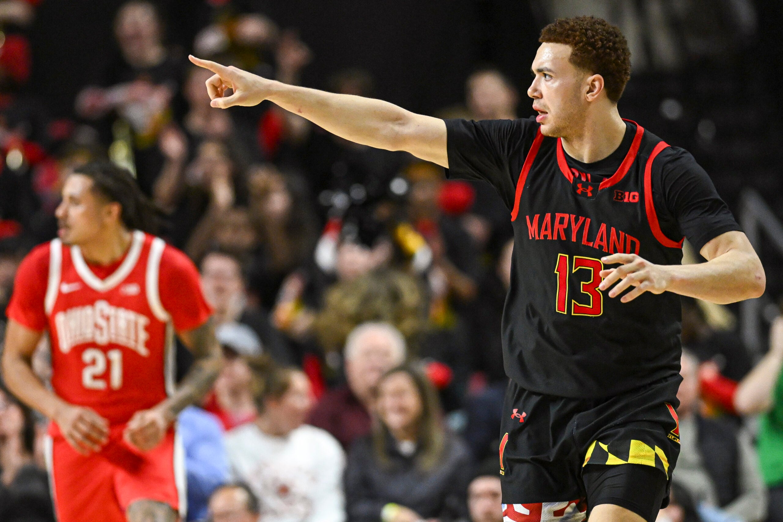 Feb 5, 2026; College Park, Maryland, USA;  Maryland Terrapins forward Elijah Saunders (13) reacts after making a three point basket against the Ohio State Buckeyes at Xfinity Center. Mandatory Credit: Tommy Gilligan-Imagn Images