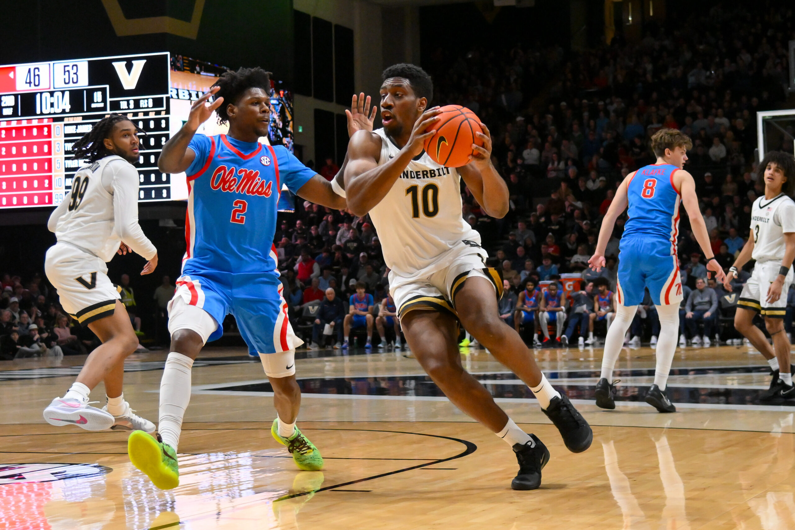 Jan 31, 2026; Nashville, TN, USA;  Vanderbilt Commodores forward Ak Okereke (10) drives to the basket past Mississippi Rebels guard AJ Storr (2) during the second half at Memorial Gymnasium. Mandatory Credit: Steve Roberts-Imagn Images
