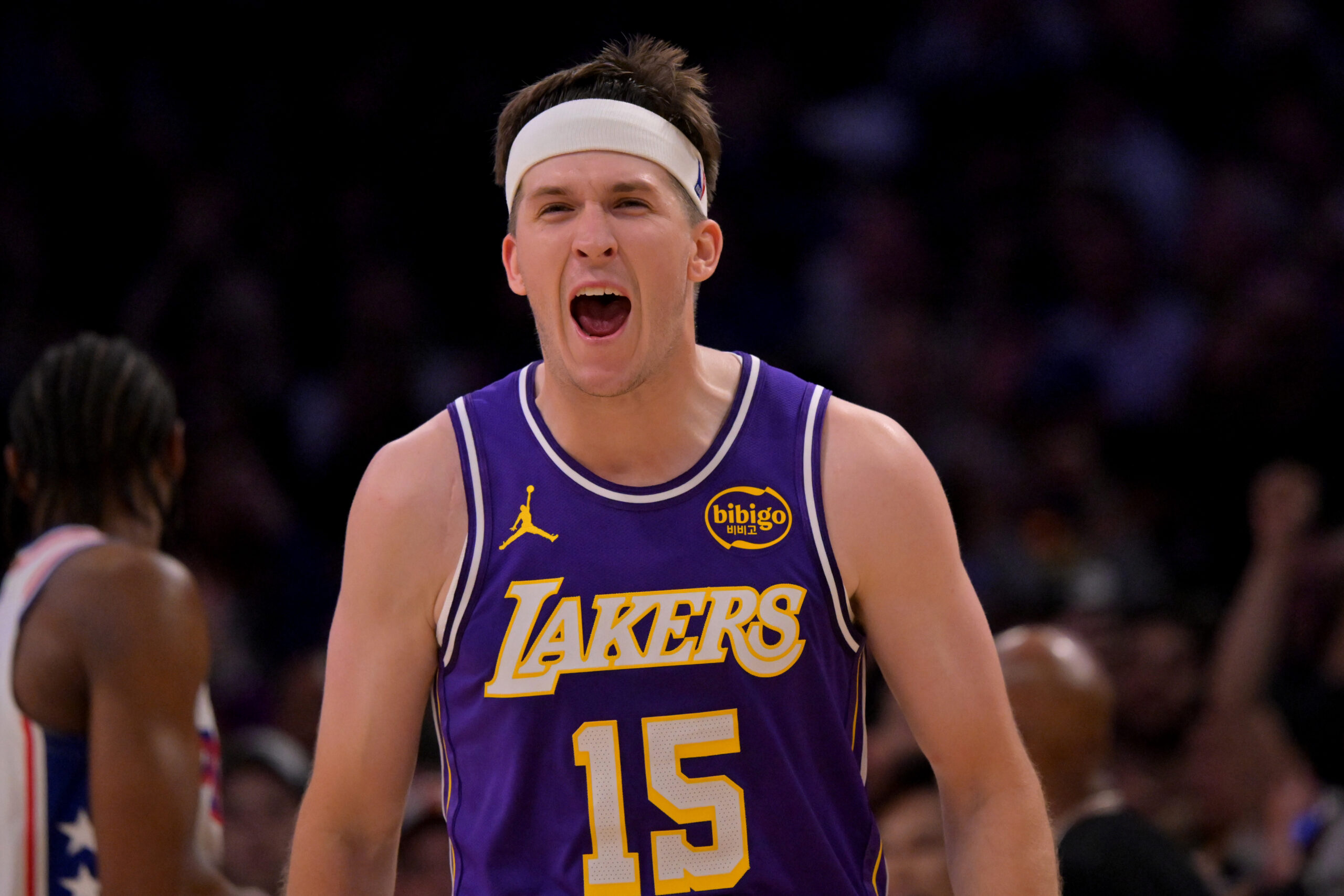 Feb 5, 2026; Los Angeles, California, USA;  Los Angeles Lakers guard Austin Reaves (15) reacts at the buzzer defeating the Philadelphia 76ers at Crypto.com Arena. Mandatory Credit: Jayne Kamin-Oncea-Imagn Images