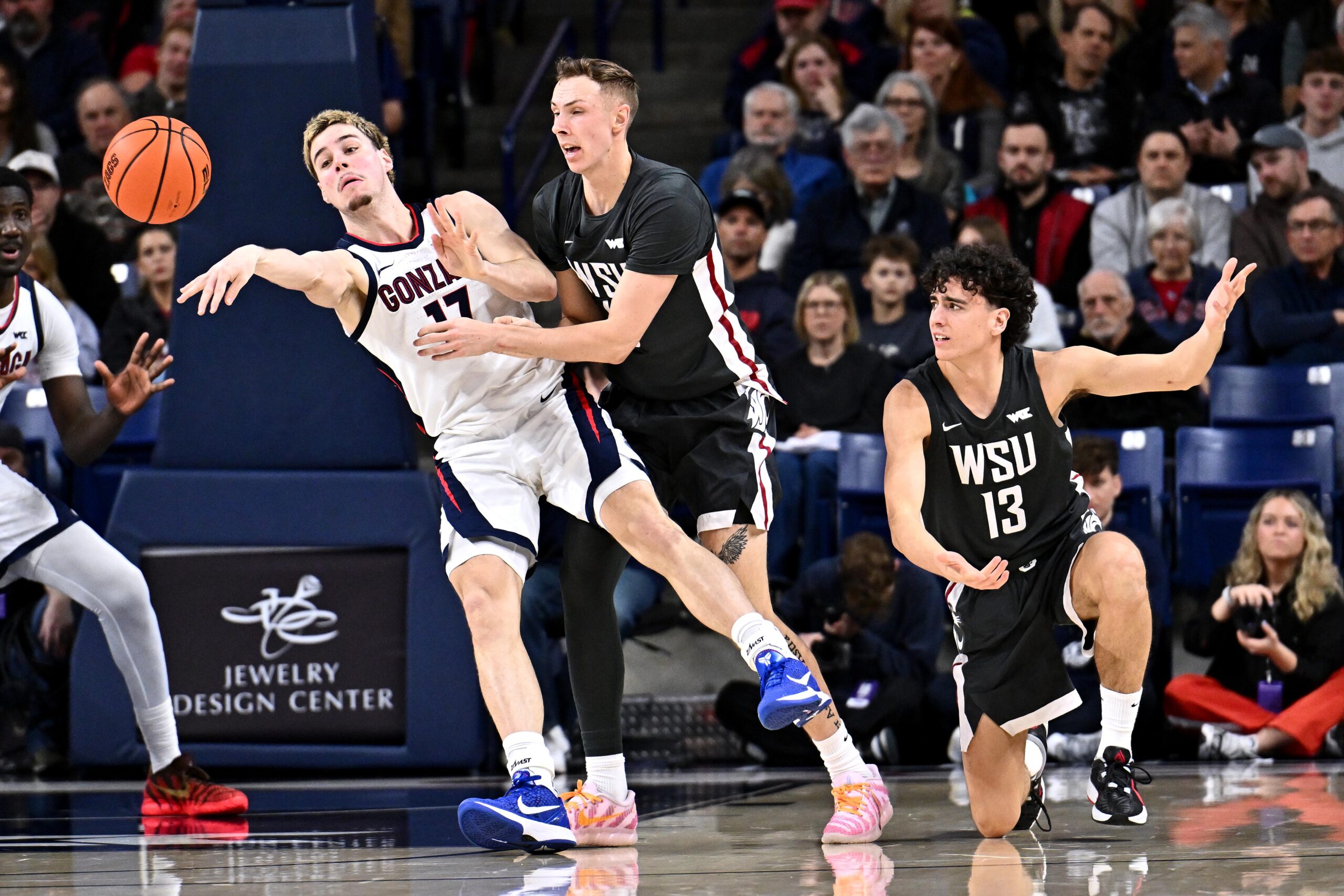 Feb 10, 2026; Spokane, Washington, USA; Gonzaga Bulldogs guard Mario Saint-Supery (17) passes the ball against Washington State Cougars forward Rihards Vavers (15) in the second half at McCarthey Athletic Center. Mandatory Credit: James Snook-Imagn Images