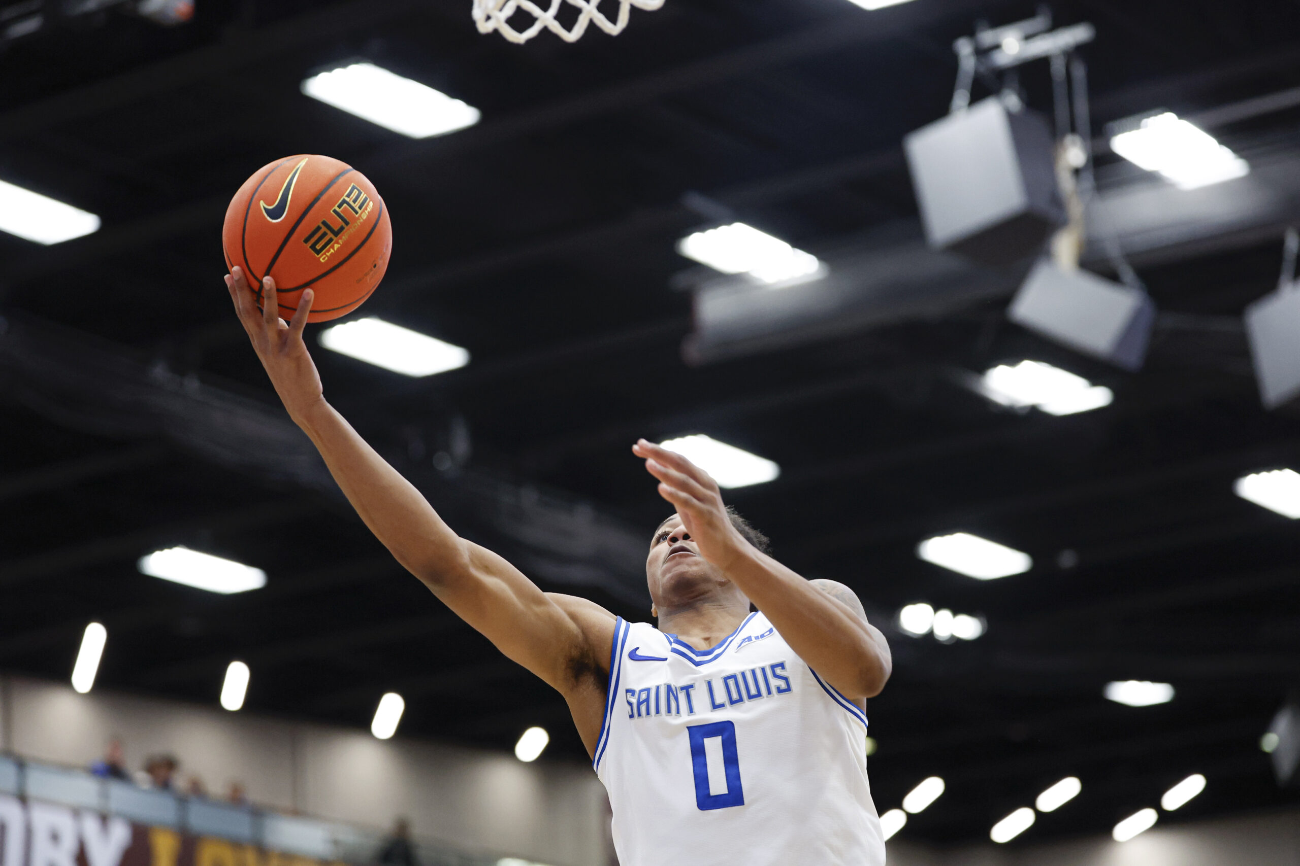 Feb 13, 2026; Chicago, Illinois, USA; Saint Louis Billikens guard Kellen Thames (0) goes to the basket against the Loyola Chicago Ramblers during the first half at Joseph J. Gentile Arena. Mandatory Credit: Kamil Krzaczynski-Imagn Images