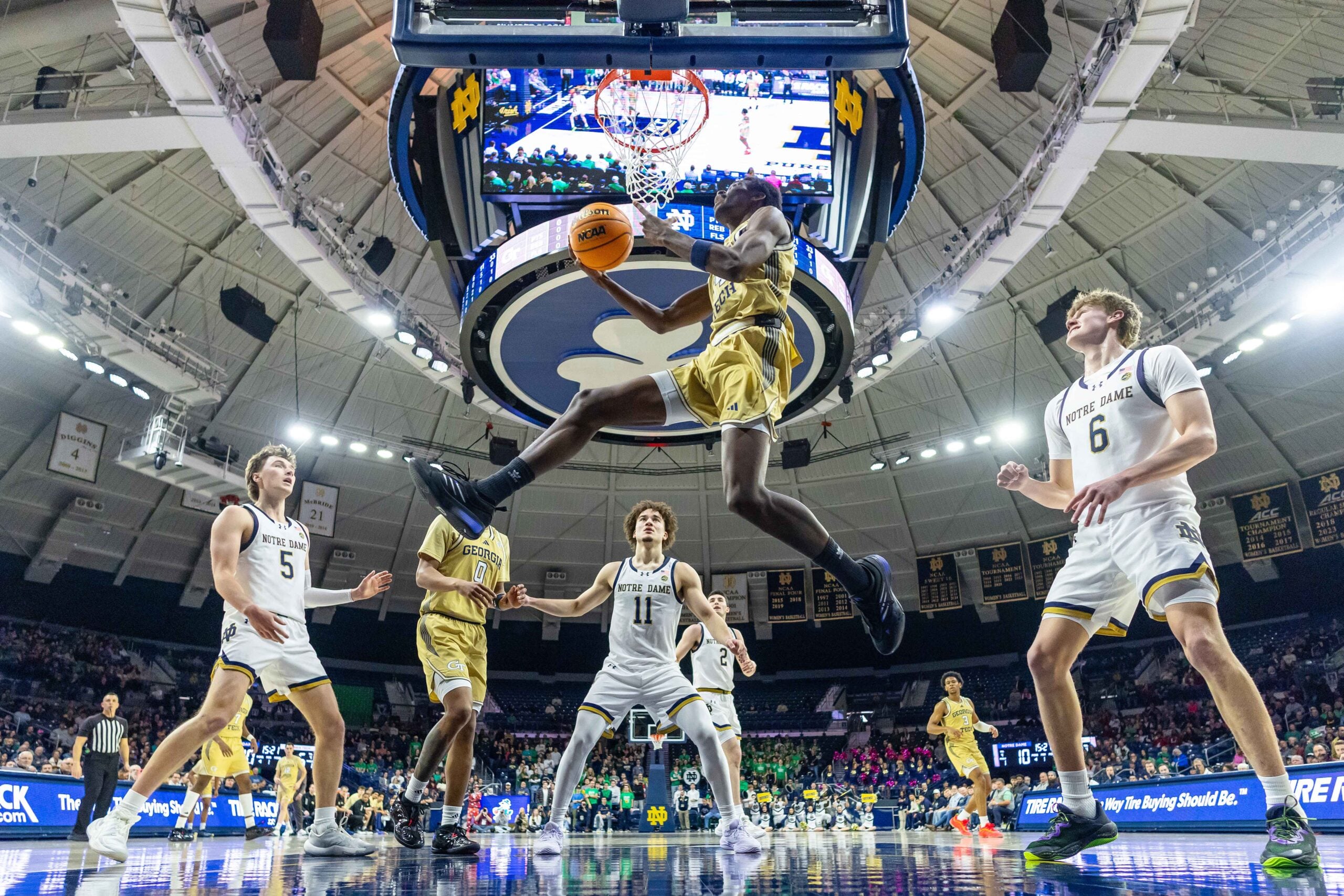 Feb 14, 2026; South Bend, Indiana, USA; Georgia Tech Yellow Jackets forward Kowacie Reeves Jr. (14) drives to the basket against the Notre Dame Fighting Irish during the first half at Purcell Pavilion at the Joyce Center. Mandatory Credit: Michael Caterina-Imagn Images