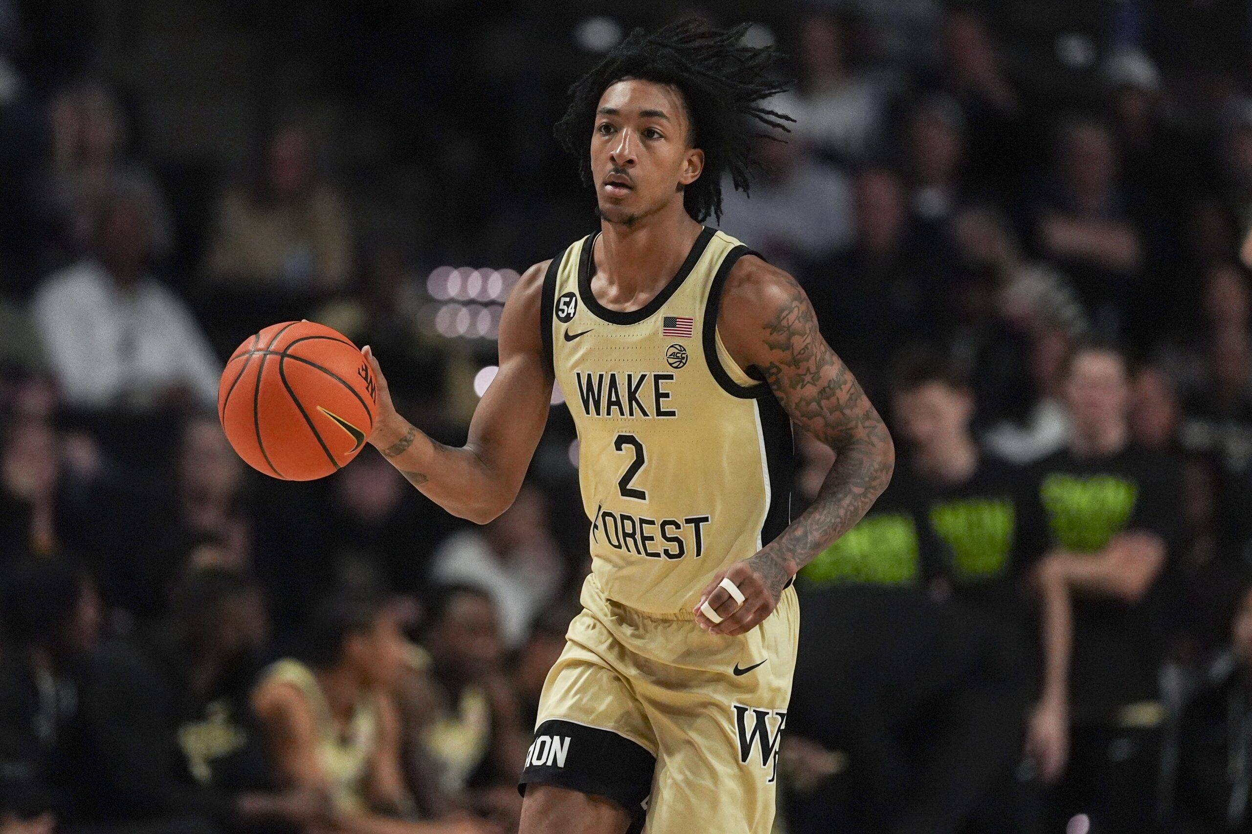 Feb 14, 2026; Winston-Salem, North Carolina, USA; Wake Forest Demon Deacons forward Juke Harris (2) brings the ball up court during the first half against the Stanford Cardinal at Lawrence Joel Veterans Memorial Coliseum. Mandatory Credit: Jim Dedmon-Imagn Images