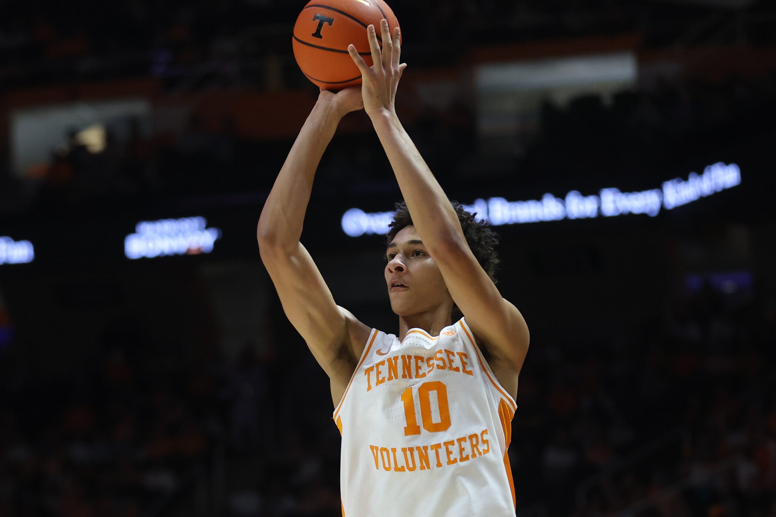 Feb 18, 2026; Knoxville, Tennessee, USA; Tennessee Volunteers forward Nate Ament (10) shoots a three pointer against the Oklahoma Sooners during the first half at Thompson-Boling Arena at Food City Center. Mandatory Credit: Randy Sartin-Imagn Images