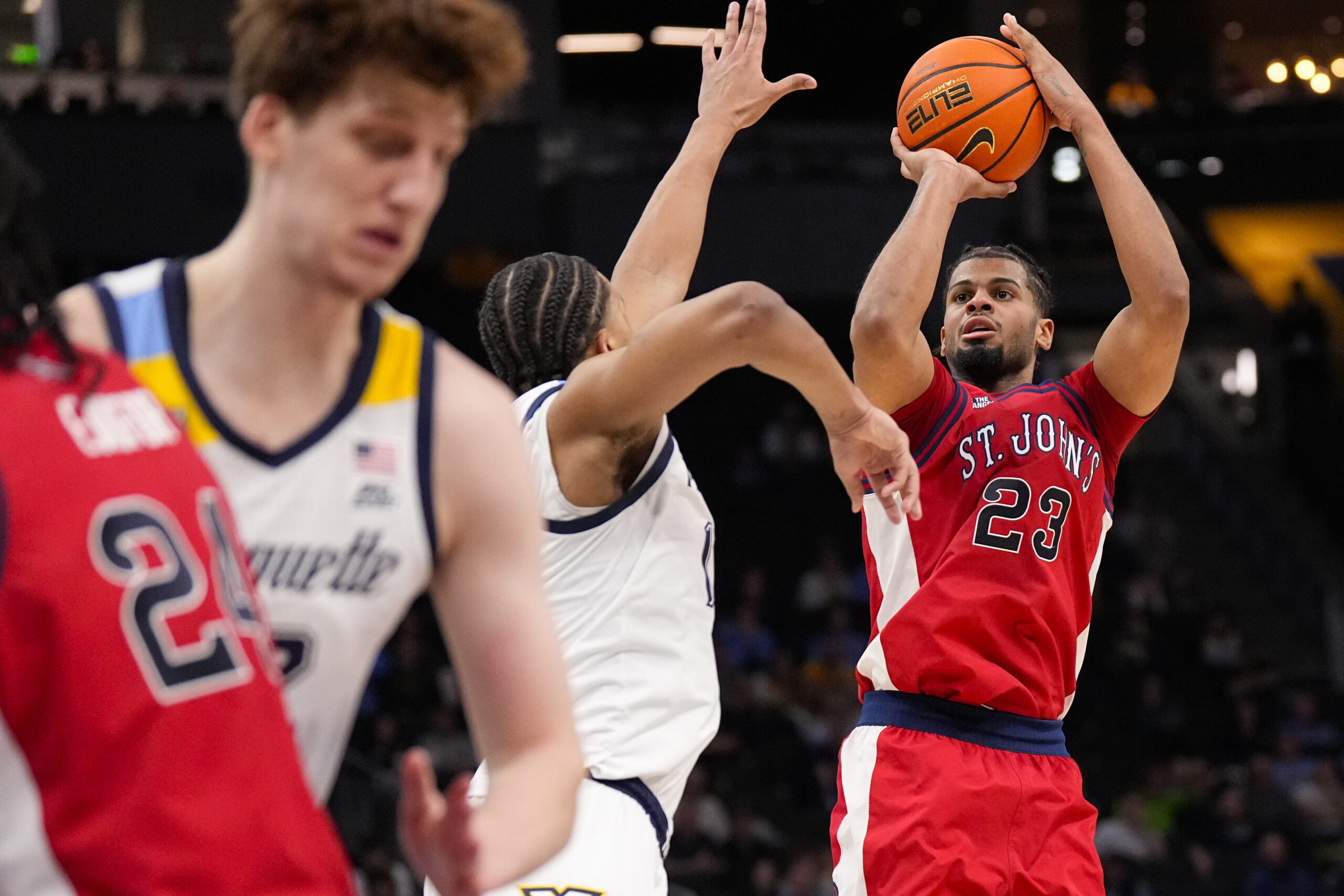 Feb 18, 2026; Milwaukee, Wisconsin, USA;  St. John’s Red Storm guard-forward Bryce Hopkins (23) shoots during the first half against the Marquette Golden Eagles at Fiserv Forum. Mandatory Credit: Jeff Hanisch-Imagn Images