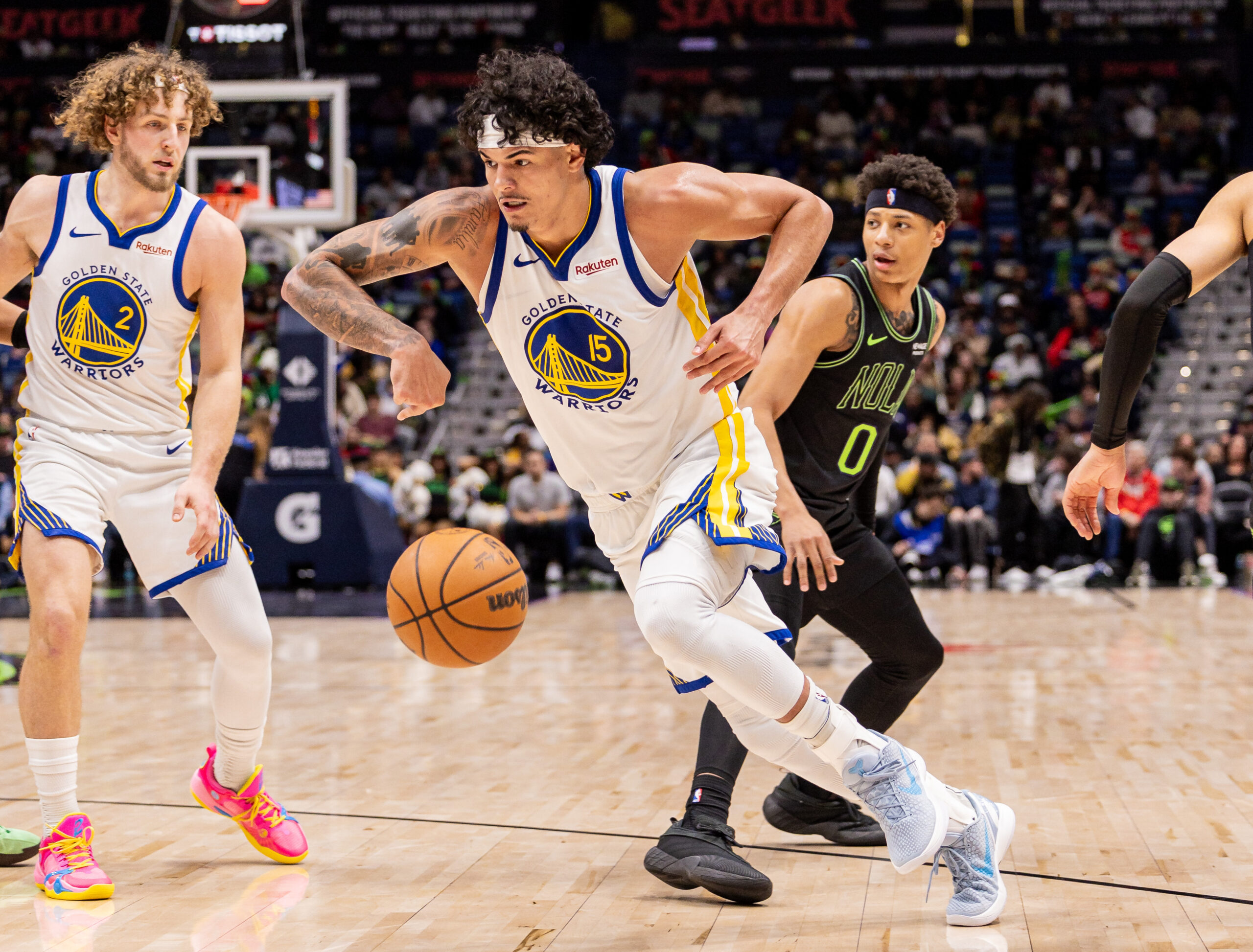 Feb 24, 2026; New Orleans, Louisiana, USA;
Golden State Warriors forward Gui Santos (15) dribbles against New Orleans Pelicans guard Jeremiah Fears (0) during the second half at Smoothie King Center. Mandatory Credit: Stephen Lew-Imagn Images