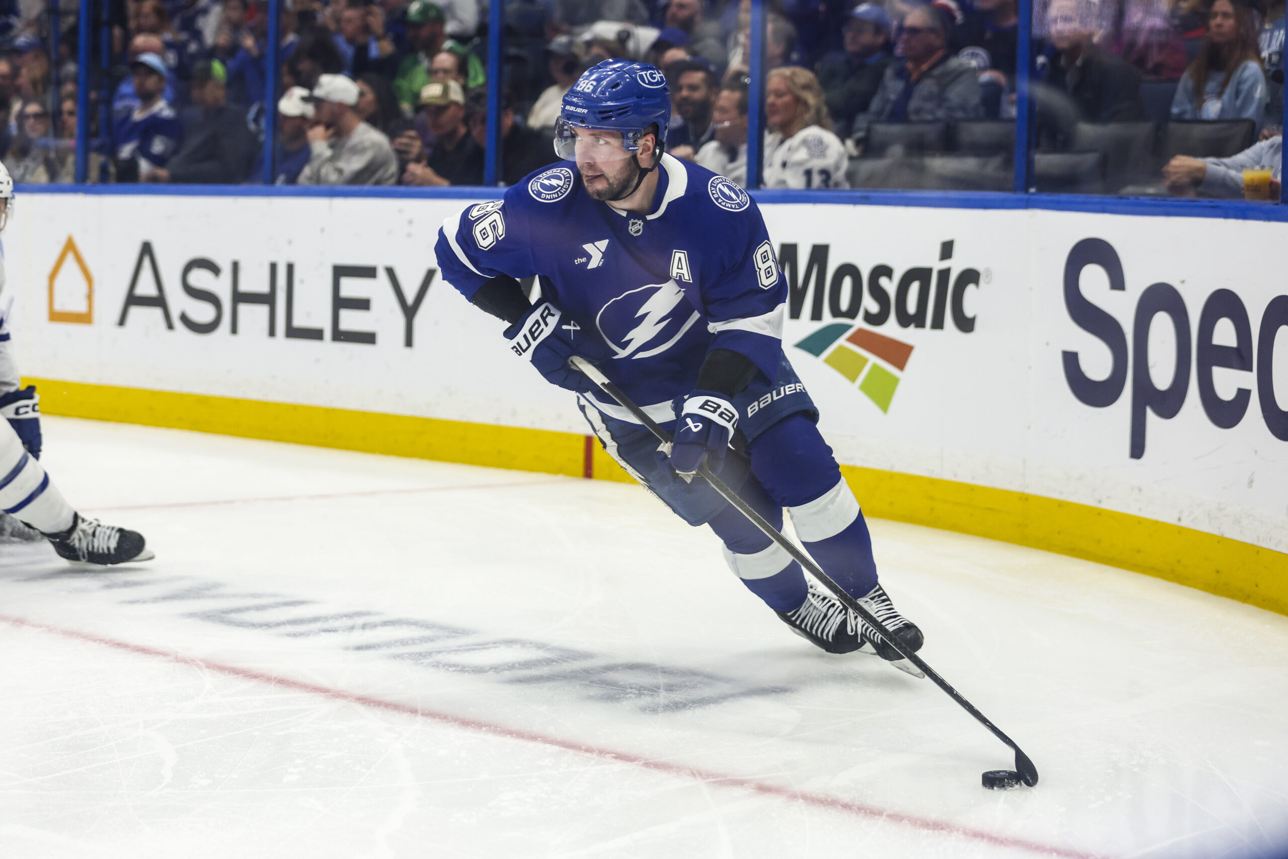 Feb 25, 2026; Tampa, Florida, USA; Tampa Bay Lightning forward Nikita Kucherov (86) handles the puck against the Toronto Maple Leafs during the third period at Benchmark International Arena. Mandatory Credit: Morgan Tencza-Imagn Images