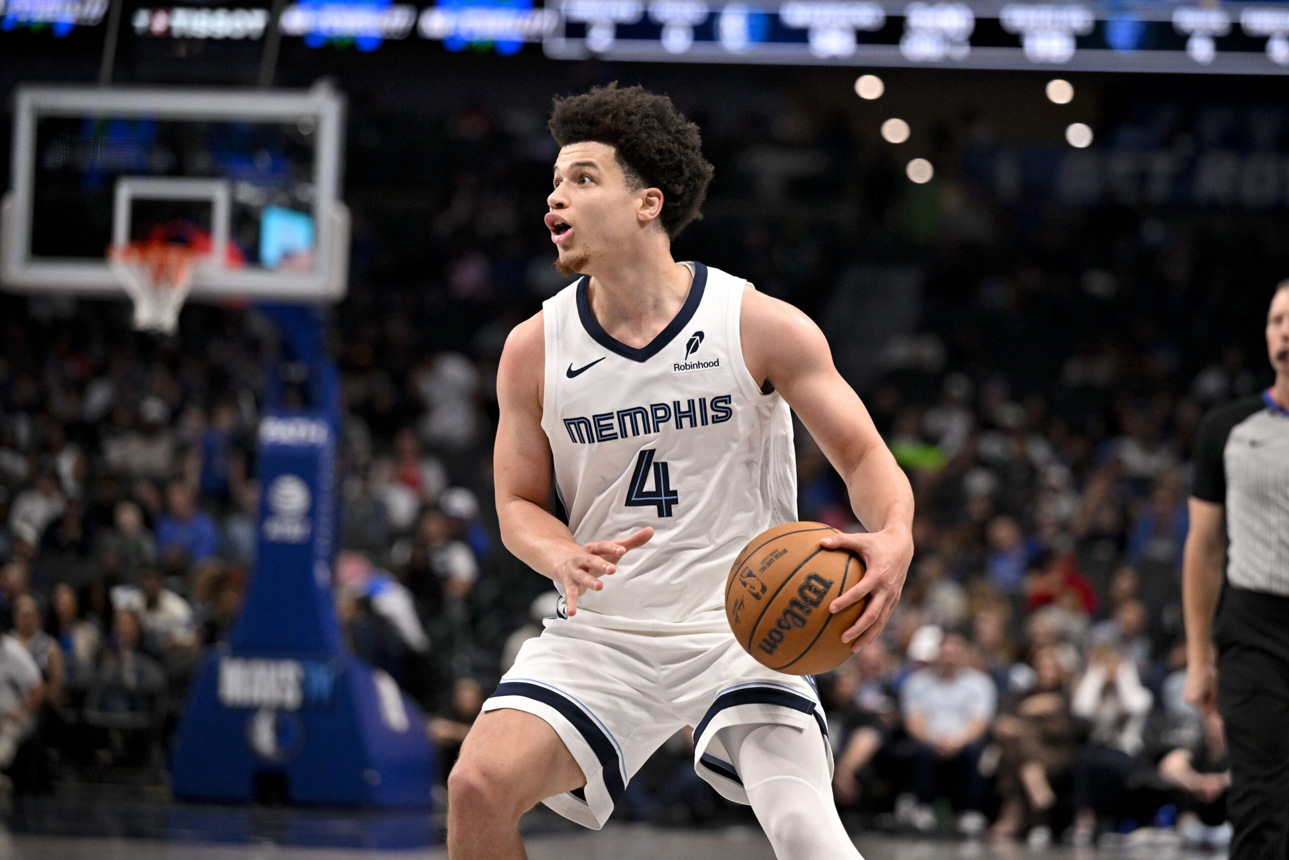 Feb 27, 2026; Dallas, Texas, USA; Memphis Grizzlies guard Walter Clayton Jr. (4) brings the ball up court against the Dallas Mavericks during the second half at the American Airlines Center. Mandatory Credit: Jerome Miron-Imagn Images