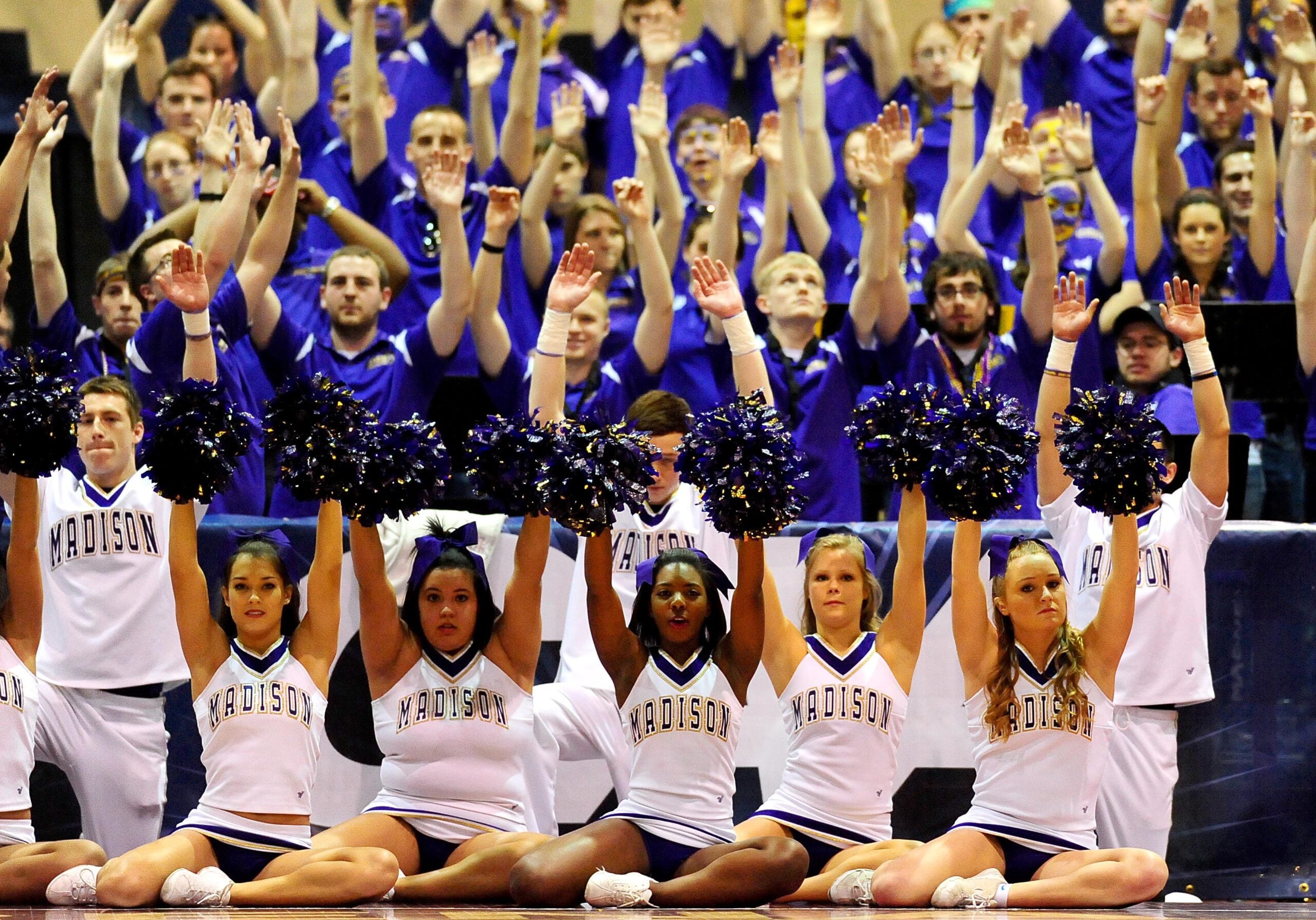 March 10, 2012; Upper Marlboro, MD, USA; James Madison Dukes cheerleaders and band during the first half of the semifinals of the 2012 CAA Tournament against the Drexel Dragons at Show Place Arena. Mandatory Credit: Evan Habeeb-Imagn Images