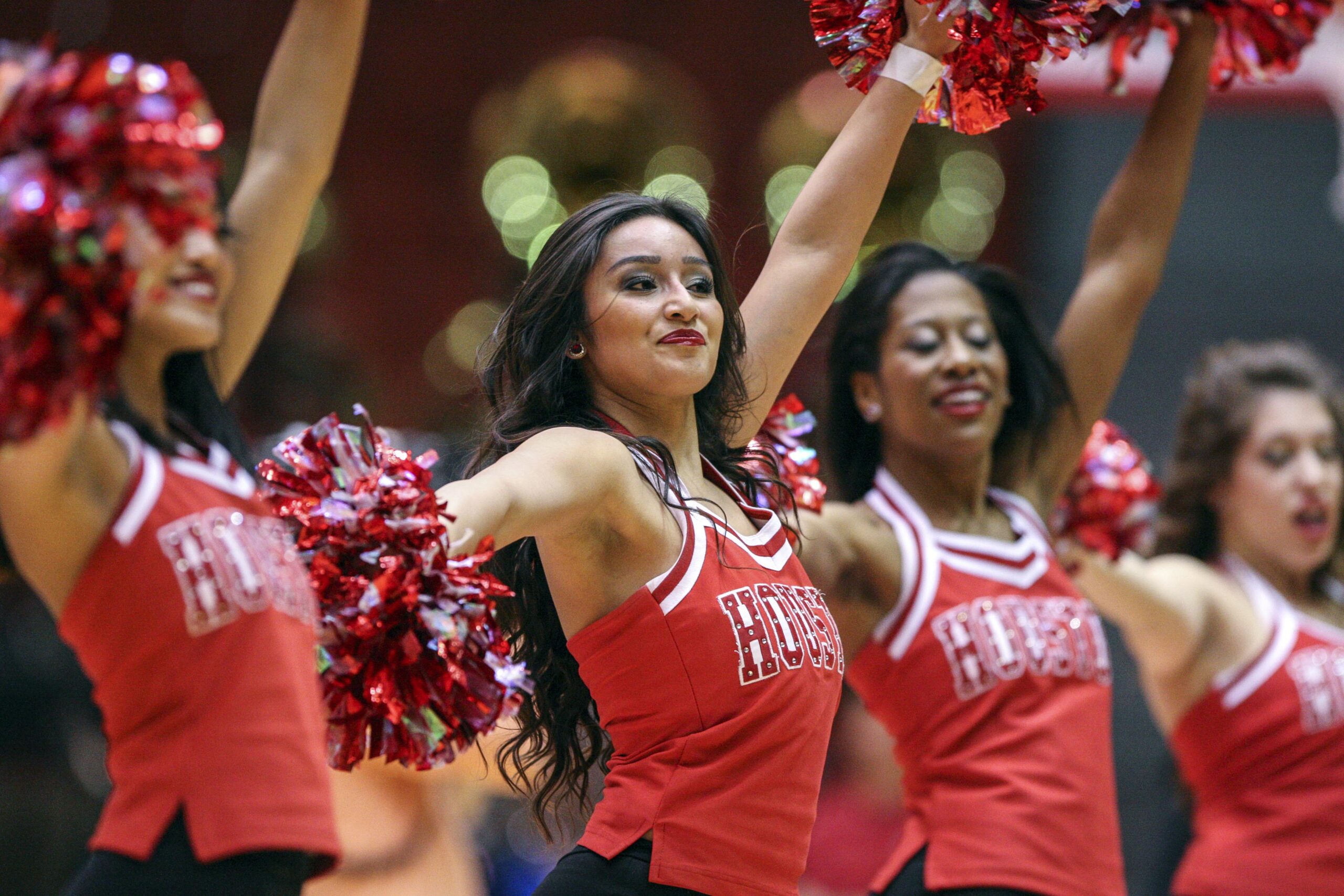 Jan 7, 2014; Houston, TX, USA; Houston Cougars cheerleaders perform before a game against the Cincinnati Bearcats at Hofheinz Pavilion. Mandatory Credit: Troy Taormina-Imagn Images
