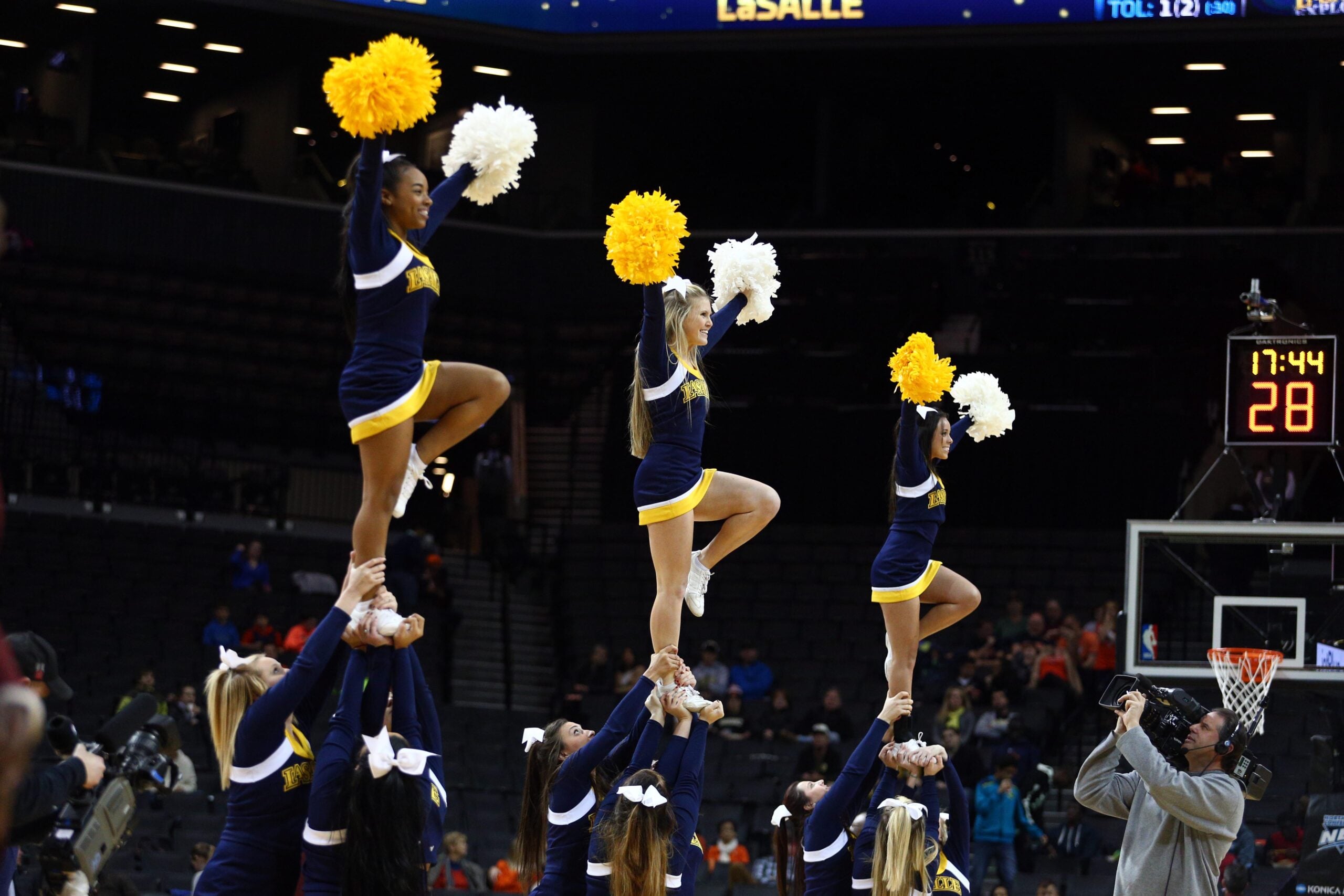 Nov 29, 2014; Brooklyn, NY, USA; La Salle Explorers cheerleaders perform during the second half against the Vanderbilt Commodores at Barclays Center. Vanderbilt defeated La Salle 68-55. Mandatory Credit: Brad Penner-Imagn Images