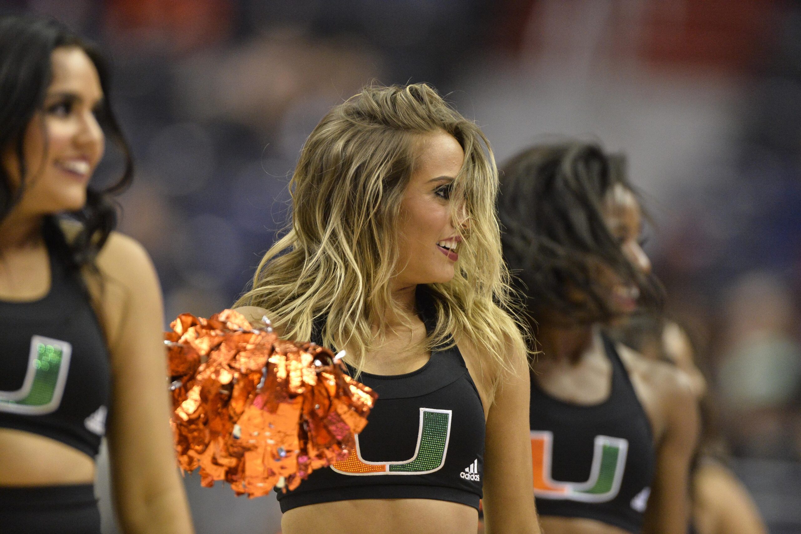 Mar 10, 2016; Washington, DC, USA; Miami Hurricanes cheerleaders perform in the second half against the Virginia Tech Hokies during day three of the ACC conference tournament at Verizon Center. Miami Hurricanes defeated Virginia Tech Hokies 88-82.  Mandatory Credit: Tommy Gilligan-Imagn Images