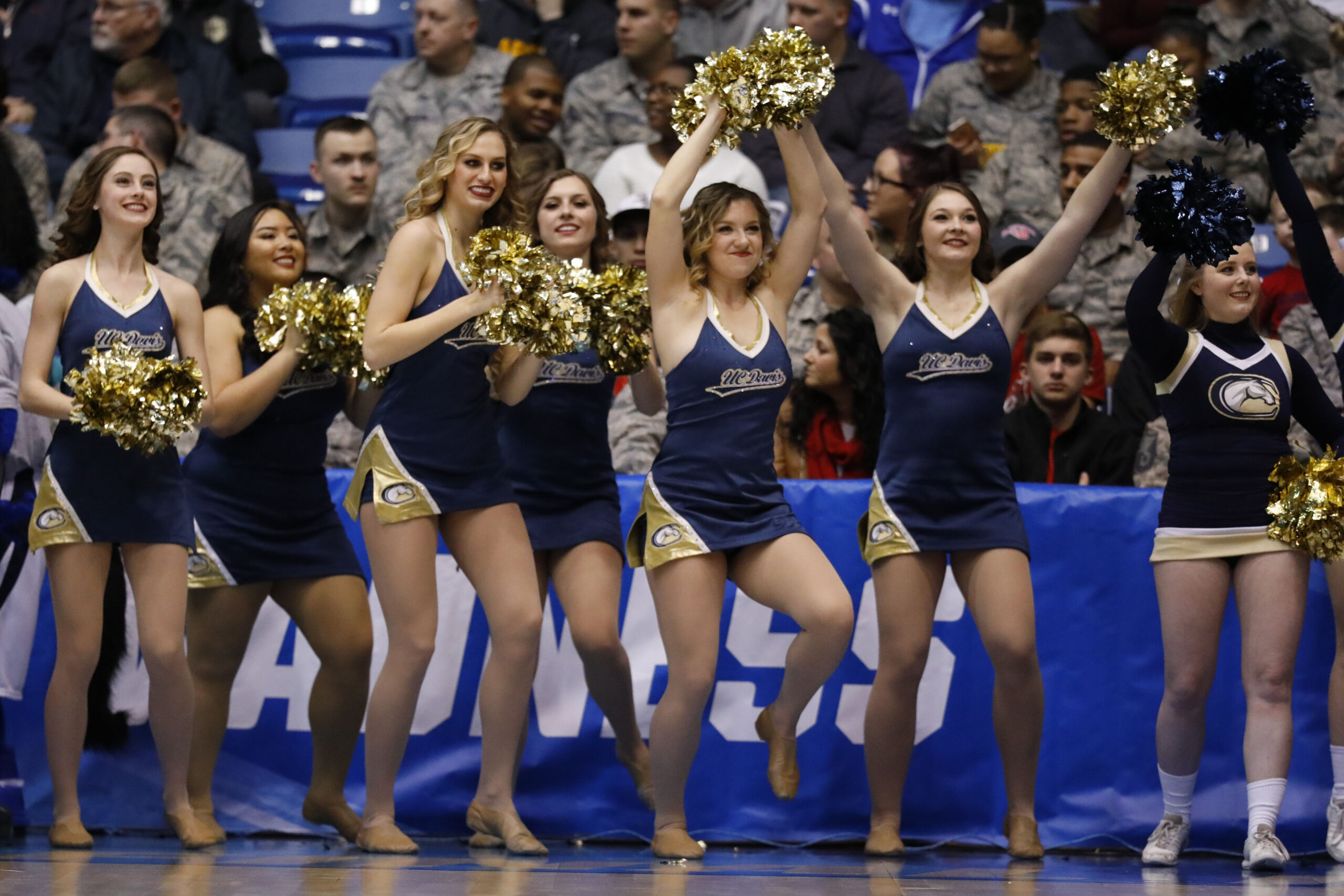 Mar 15, 2017; Dayton, OH, USA; UC Davis Aggies cheerleaders in the first half against the North Carolina Central Eagles in the first four of the 2017 NCAA Tournament at Dayton Arena. Mandatory Credit: Rick Osentoski-Imagn Images