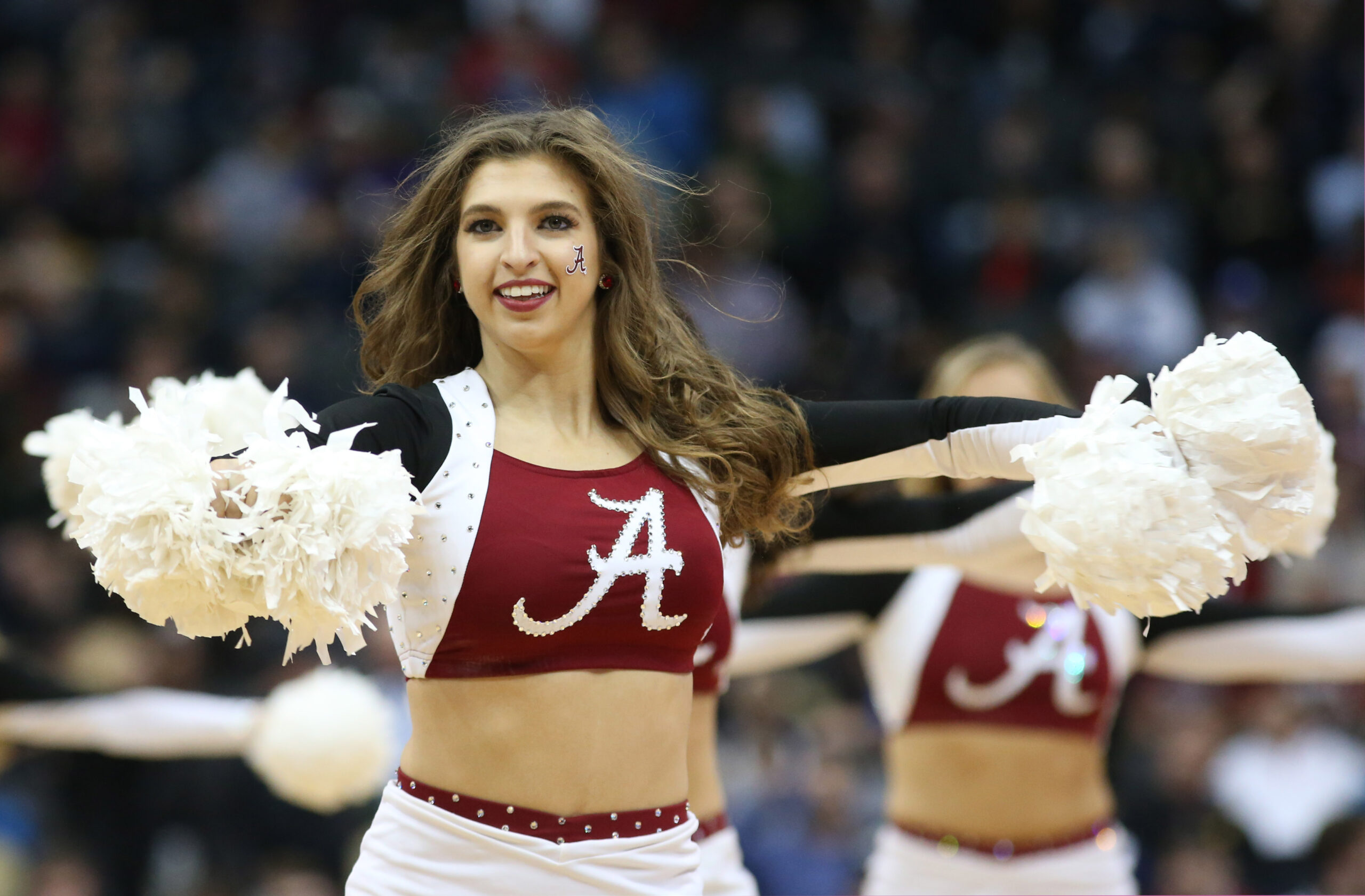 Mar 15, 2018; Pittsburgh, PA, USA;  Alabama Crimson Tide cheerleaders cheer against the Virginia Tech Hokies during the first half in the first round of the 2018 NCAA Tournament at PPG Paints Arena. Alabama won 86-83. Mandatory Credit: Charles LeClaire-Imagn Images