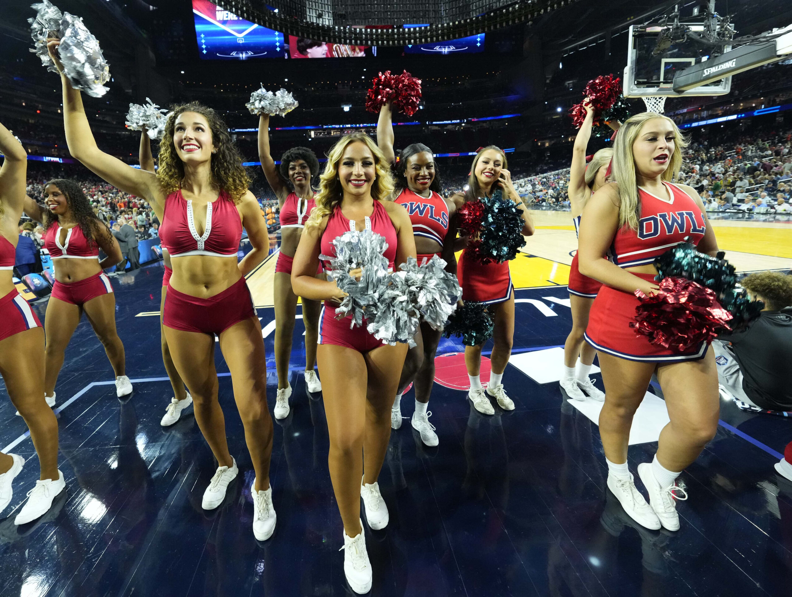 Apr 1, 2023; Houston, TX, USA; Florida Atlantic Owls cheerleaders perform in the semifinals of the Final Four of the 2023 NCAA Tournament against the San Diego State Aztecs at NRG Stadium. Mandatory Credit: Robert Deutsch-Imagn Images