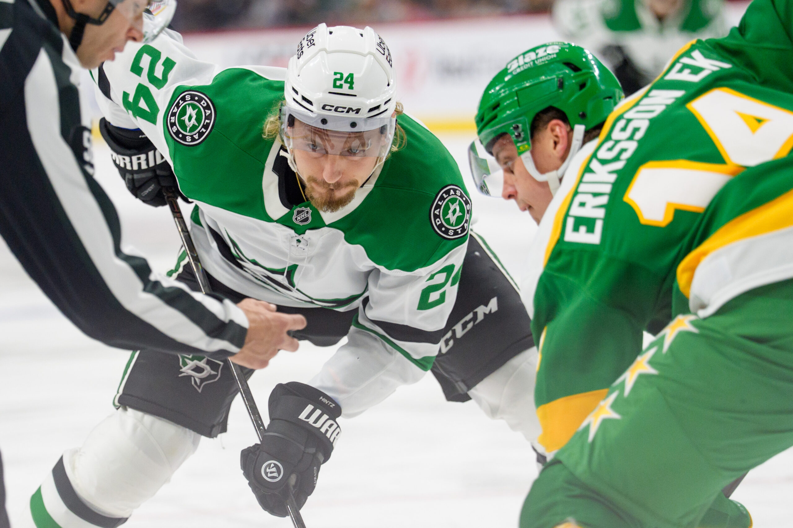 Dec 11, 2025; Saint Paul, Minnesota, USA; Dallas Stars center Roope Hintz (24) faces off against Minnesota Wild center Joel Eriksson Ek (14) in the second period at Grand Casino Arena. Mandatory Credit: Matt Blewett-Imagn Images