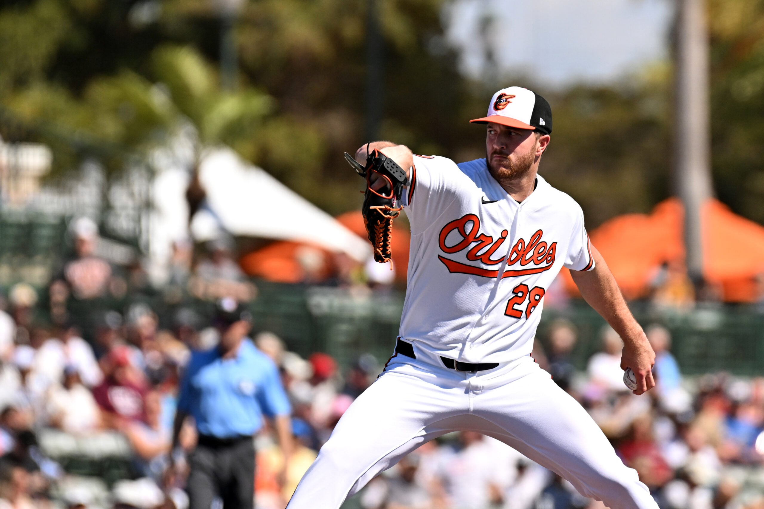 Feb 20, 2026; Sarasota, Florida, USA; Baltimore Orioles starting pitcher Trevor Rogers (28) throws a pitch in the first inning against the New York Yankees during spring training at Ed Smith Stadium. Mandatory Credit: Jonathan Dyer-Imagn Images