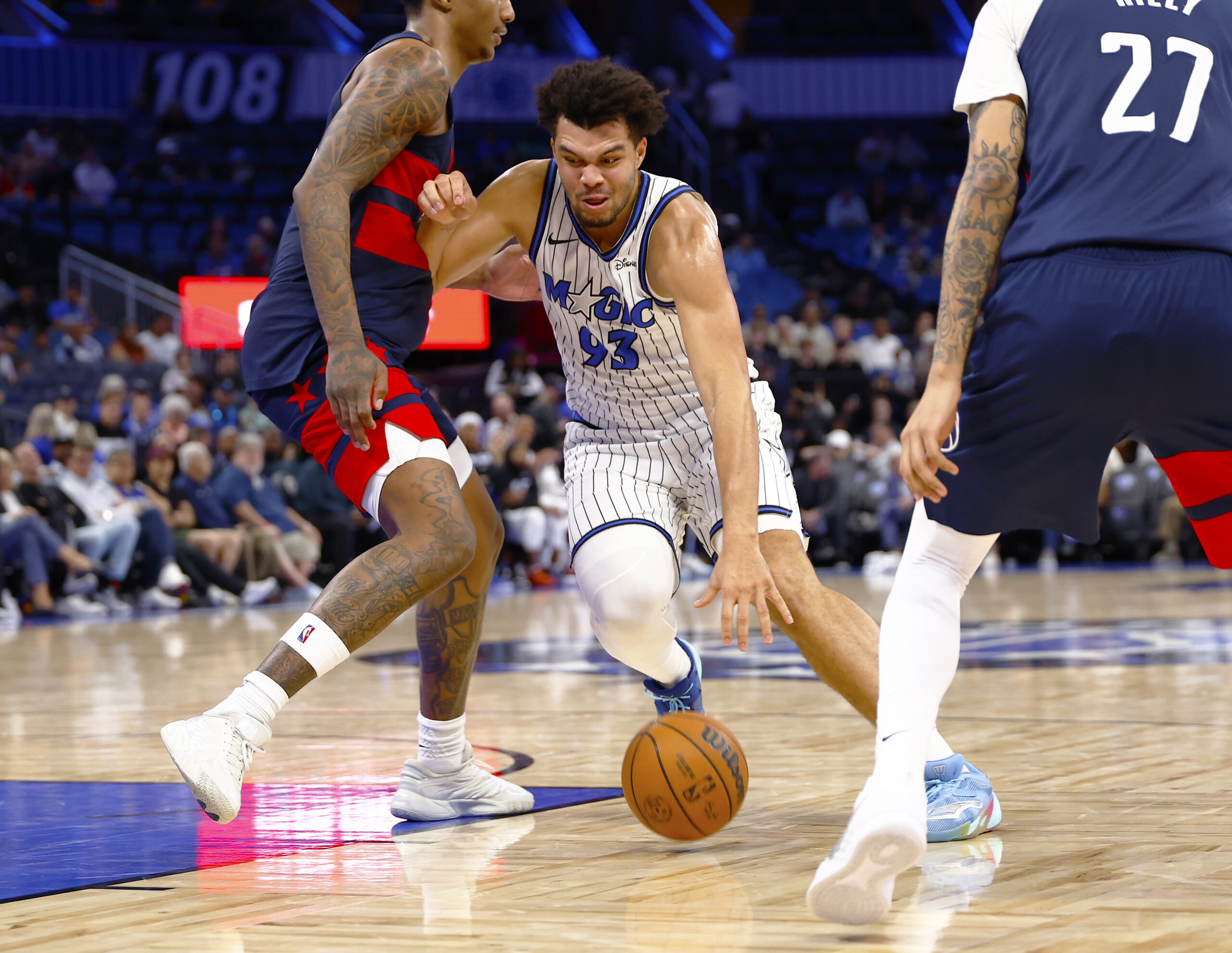 Mar 3, 2026; Orlando, Florida, USA;  Orlando Magic forward Noah Penda (93) drives to the basket in the second half against the Washington Wizards at Kia Center. Mandatory Credit: Russell Lansford-Imagn Images