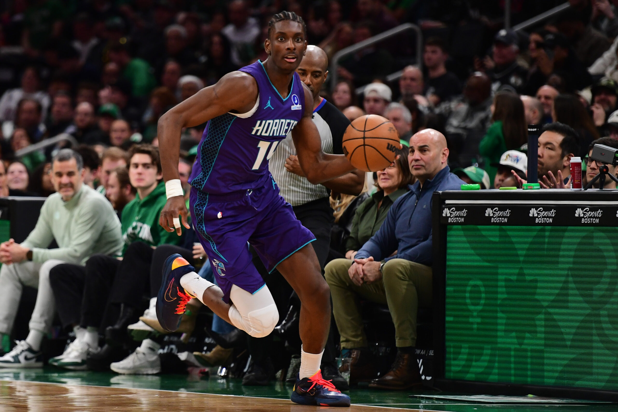 Mar 4, 2026; Boston, Massachusetts, USA;  Charlotte Hornets forward Moussa Diabate (14) controls the ball during the second half against the Boston Celtics at TD Garden. Mandatory Credit: Bob DeChiara-Imagn Images