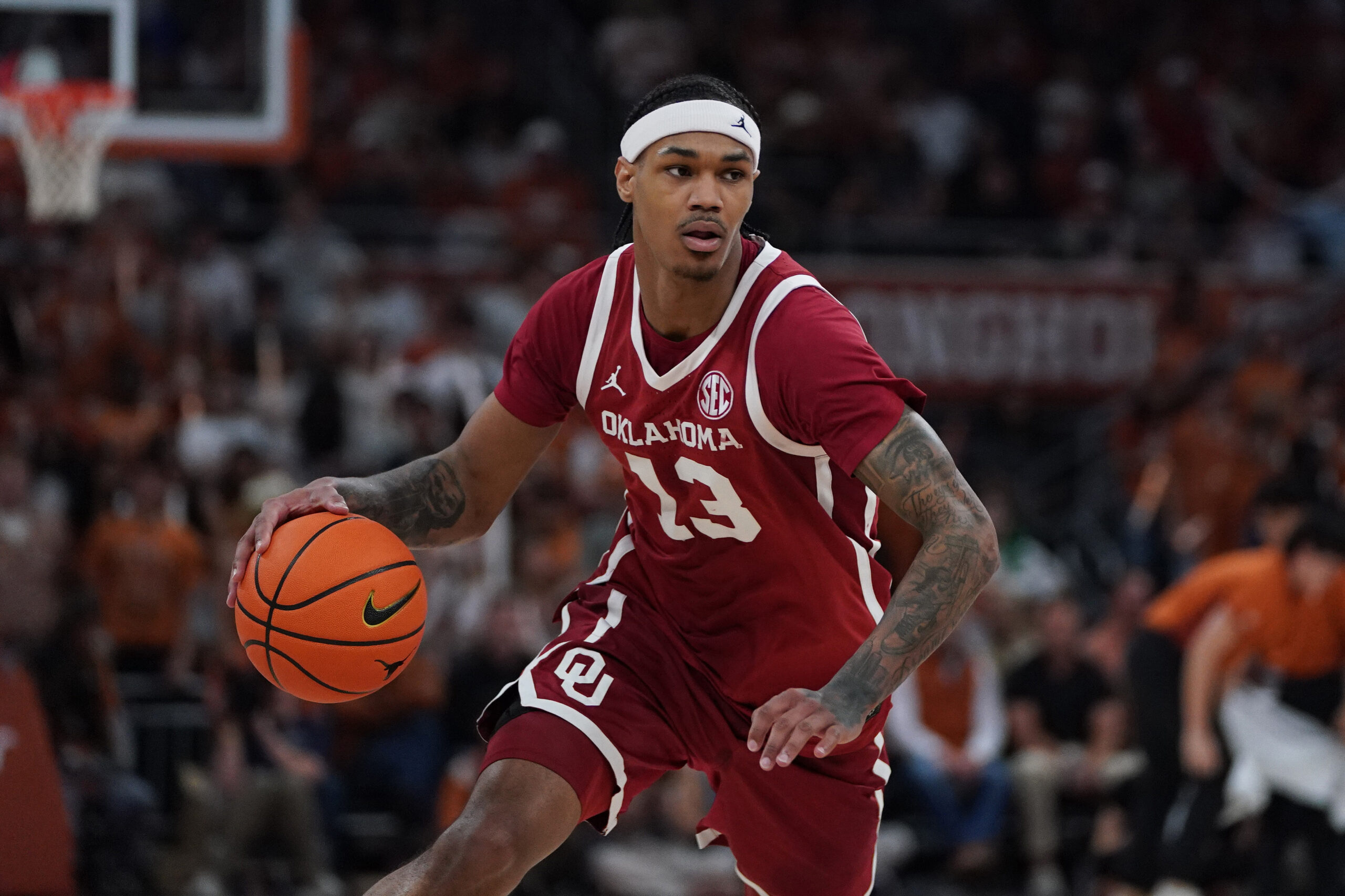 Mar 7, 2026; Austin, Texas, USA; Oklahoma Sooners forward Tae Davis (13) dribbles during the second half against the Texas Longhorns at Moody Center. Mandatory Credit: Dustin Safranek-Imagn Images