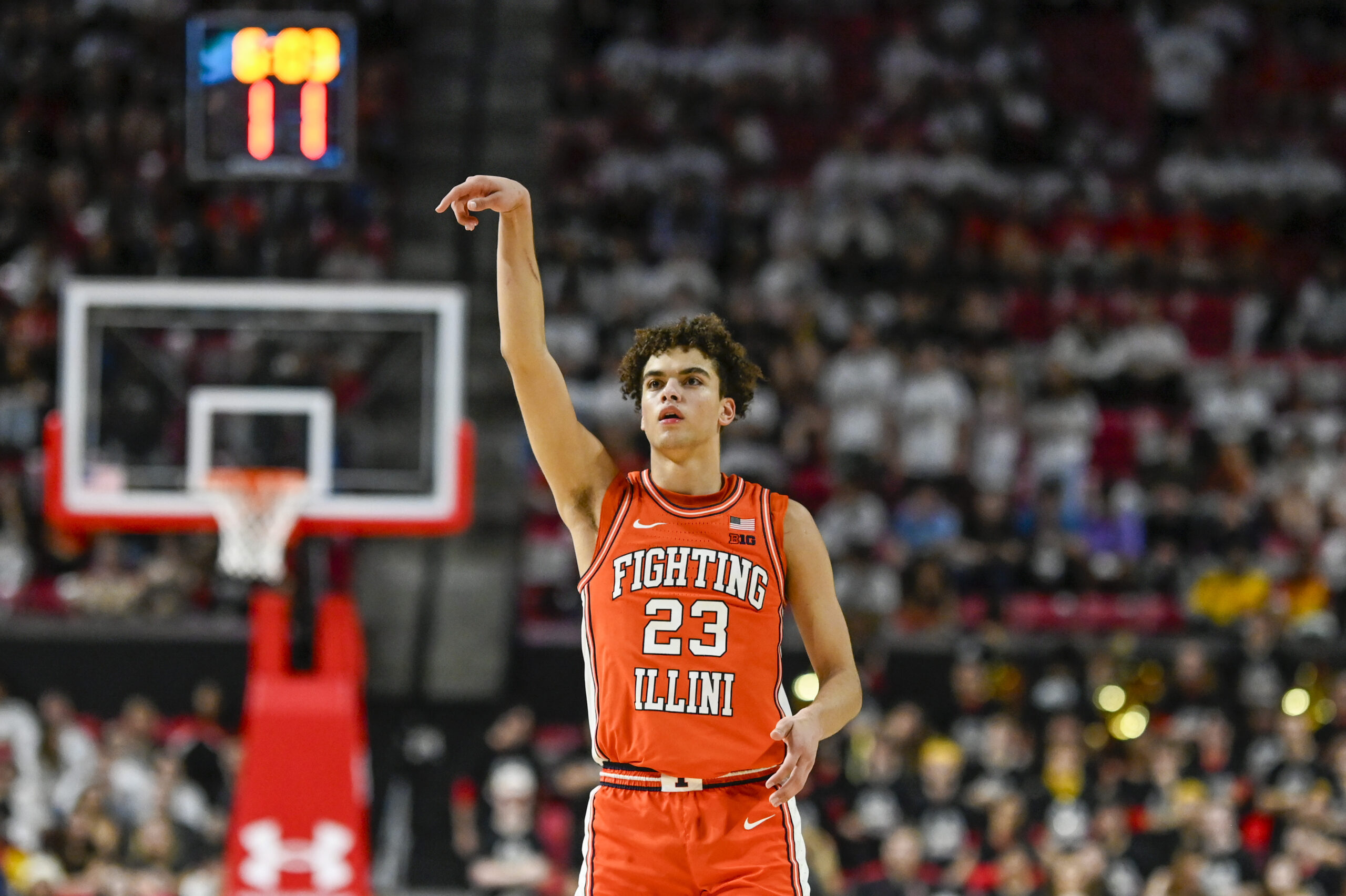 Mar 8, 2026; College Park, Maryland, USA;  Illinois Fighting Illini guard Keaton Wagler (23) reacts after shooting a three point basket during the first  half against the Maryland Terrapins at Xfinity Center. Mandatory Credit: Tommy Gilligan-Imagn Images