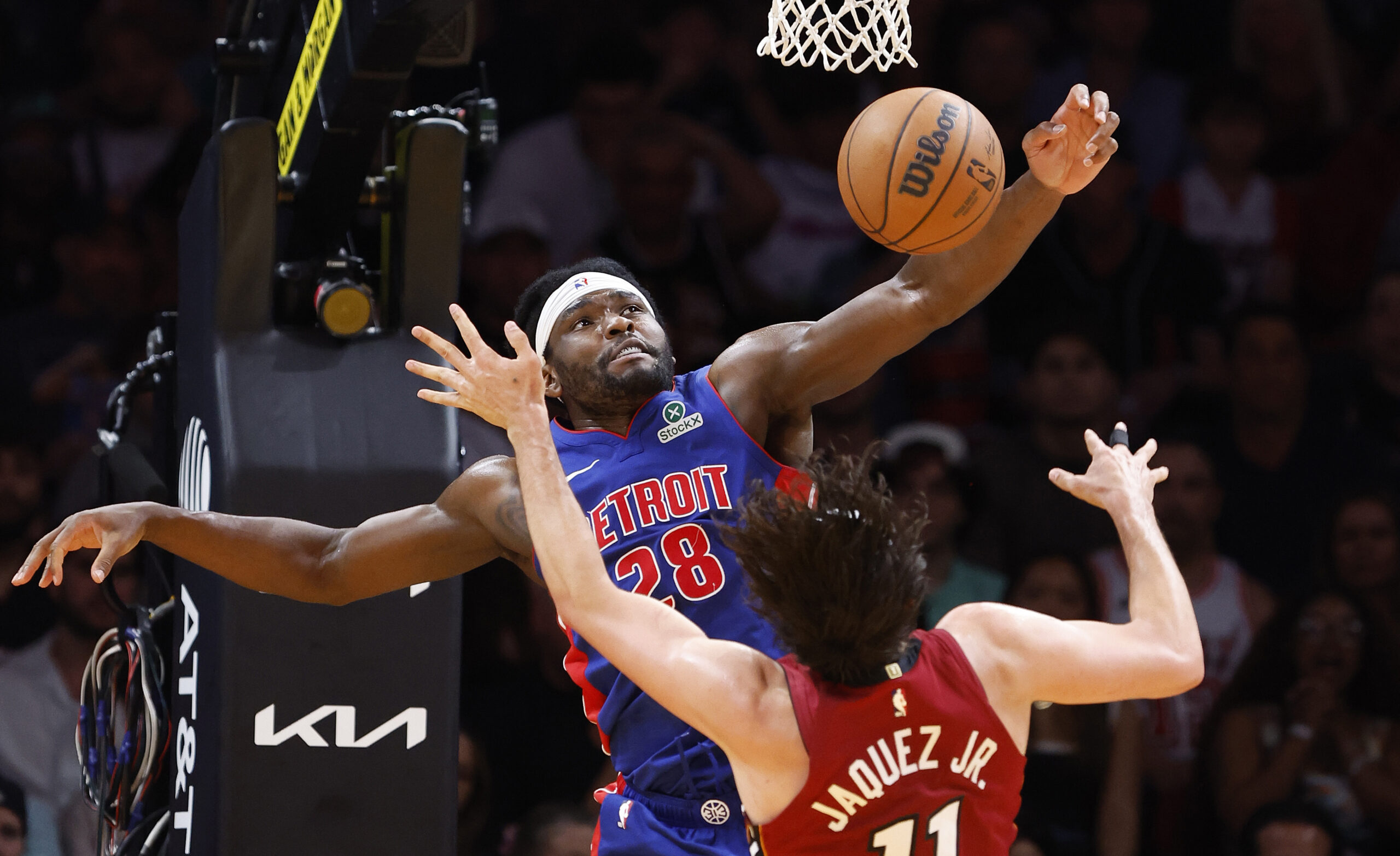 Mar 8, 2026; Miami, Florida, USA;  Detroit Pistons forward Isaiah Stewart (28) blocks a shot by Miami Heat forward Jaime Jaquez Jr. (11) during the second half at Kaseya Center. Mandatory Credit: Rhona Wise-Imagn Images