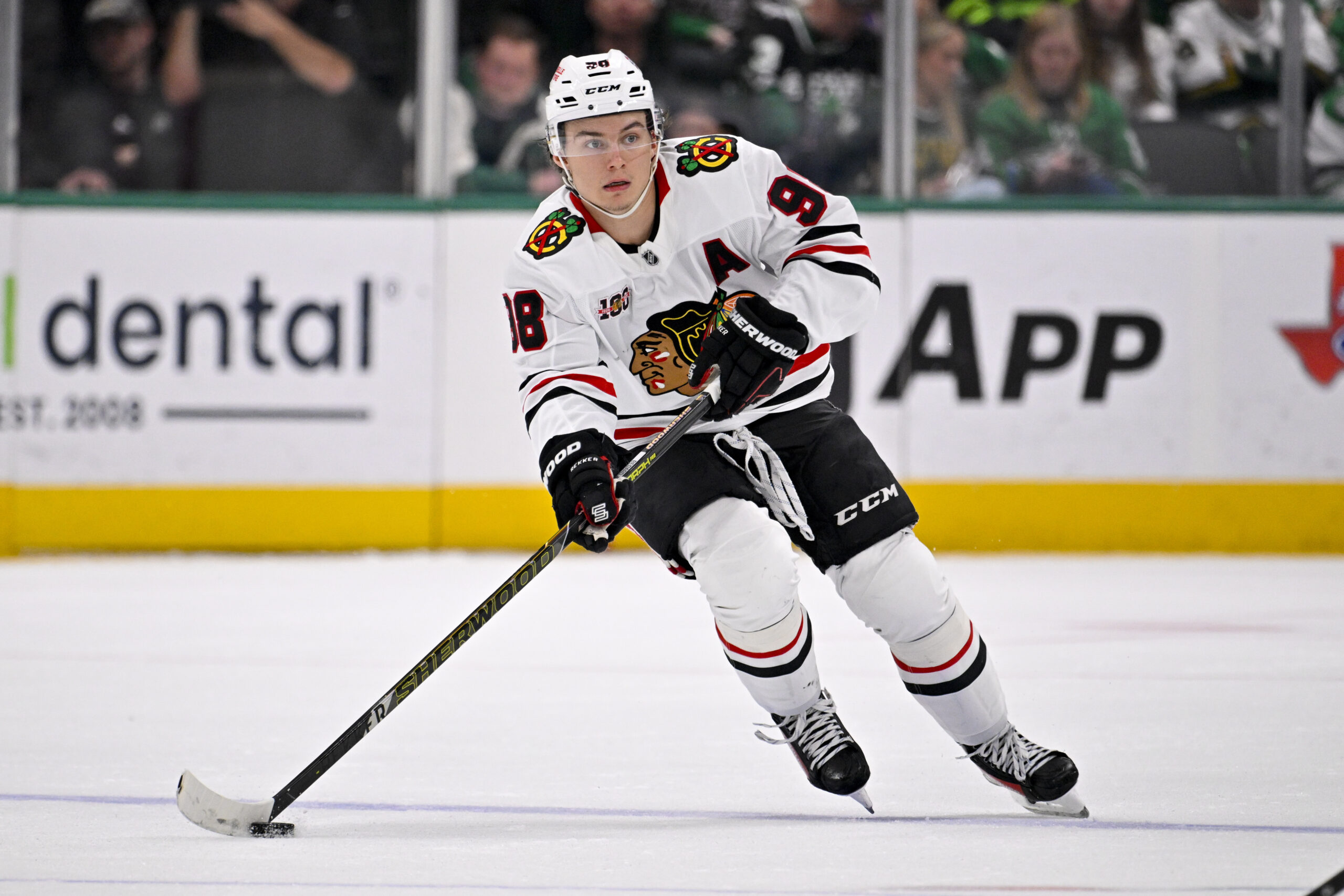 Mar 8, 2026; Dallas, Texas, USA; Chicago Blackhawks center Connor Bedard (98) skates against the Dallas Stars during the game between the Stars and the Blackhawks at American Airlines Center. Mandatory Credit: Jerome Miron-Imagn Images