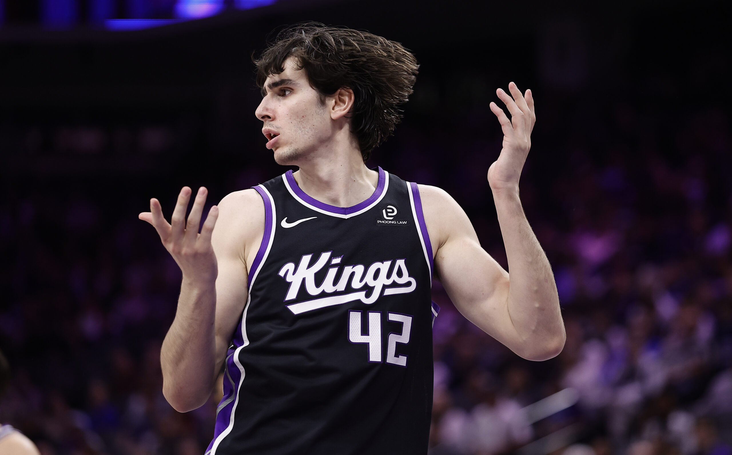 Mar 11, 2026; Sacramento, California, USA; Sacramento Kings center Maxime Raynaud (42) questions a call against the Charlotte Hornets during the fourth quarter at Golden 1 Center. Mandatory Credit: Kelley L Cox-Imagn Images