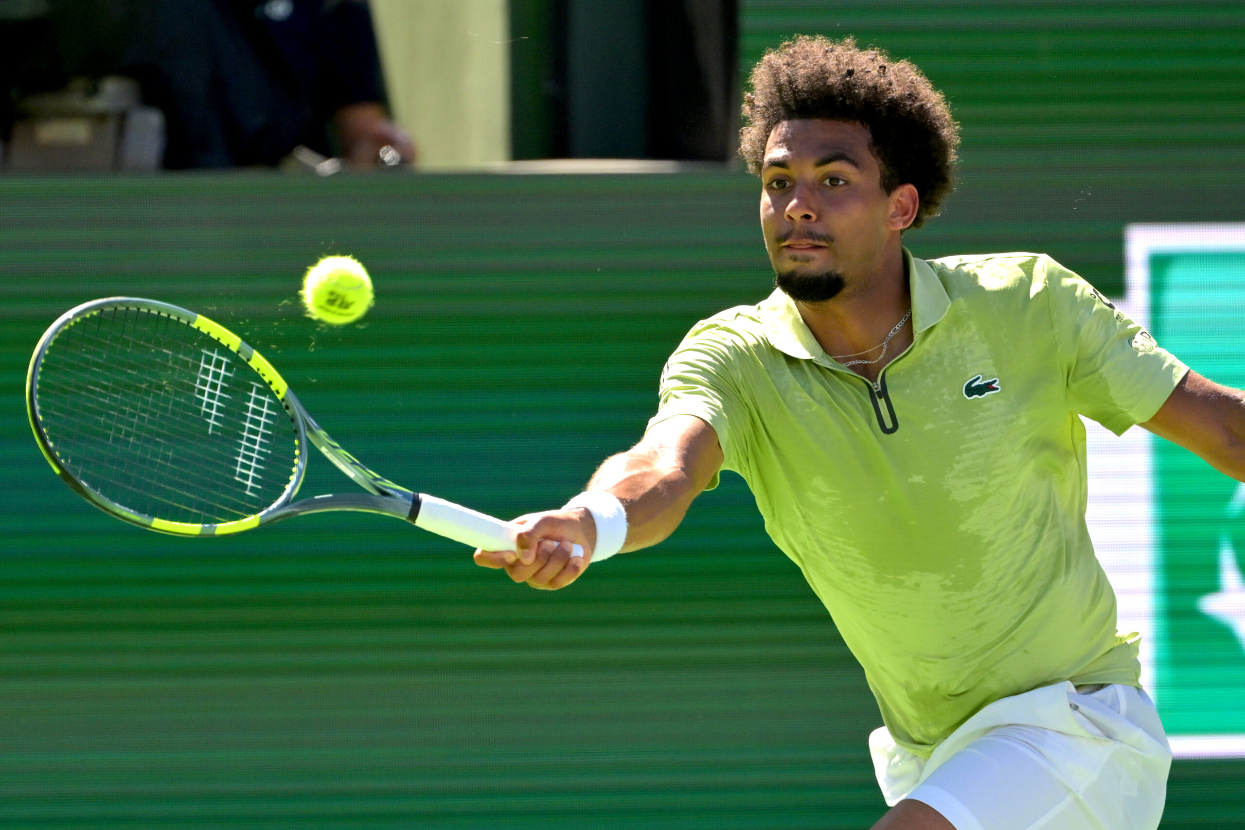 Mar 12, 2026; Indian Wells, CA, USA;  Arthur Fils (FRA) hits a shot in his quarterfinal match against Alexander Zverev (GER) during the BNP Paribas Open at the Indian Wells Tennis Garden. Mandatory Credit: Jayne Kamin-Oncea-Imagn Images