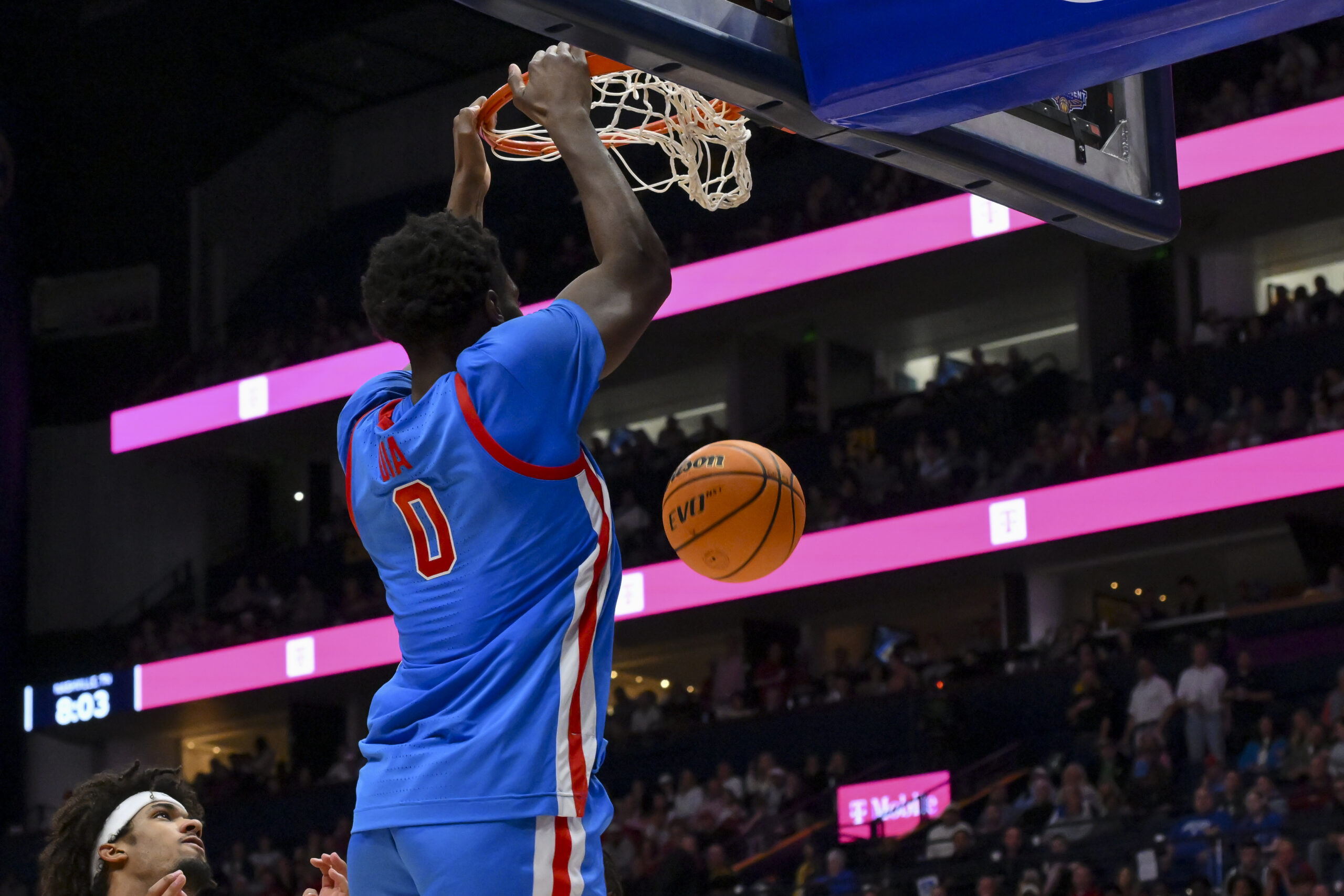 Mar 13, 2026; Nashville, TN, USA;  Mississippi Rebels forward Malik Dia (0) dunks the ball against the Alabama Crimson Tide during the second half at Bridgestone Arena. Mandatory Credit: Steve Roberts-Imagn Images
