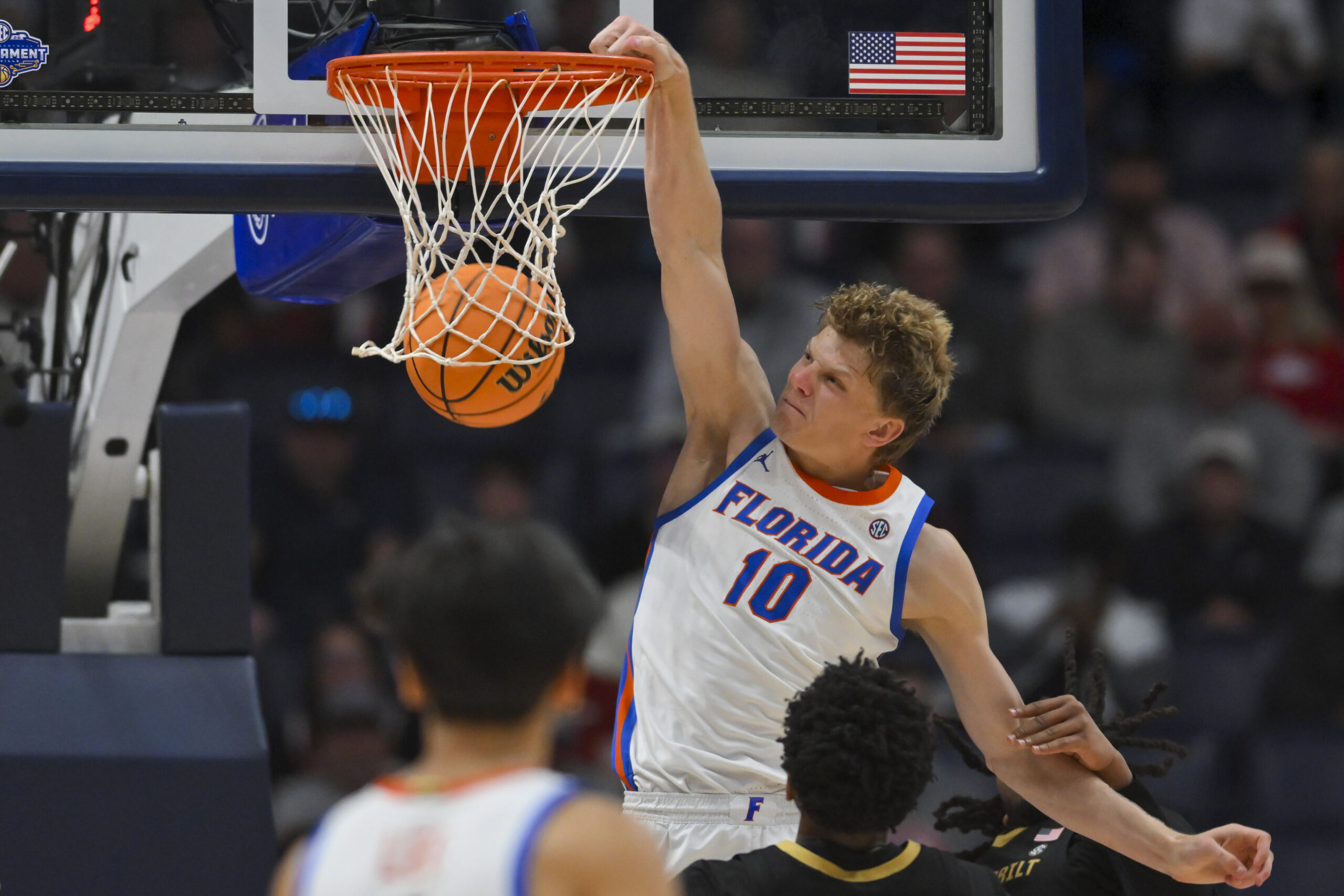 Mar 14, 2026; Nashville, TN, USA;  Florida Gators forward Thomas Haugh (10) dunks the ball against the Vanderbilt Commodores during the second half at Bridgestone Arena. Mandatory Credit: Steve Roberts-Imagn Images