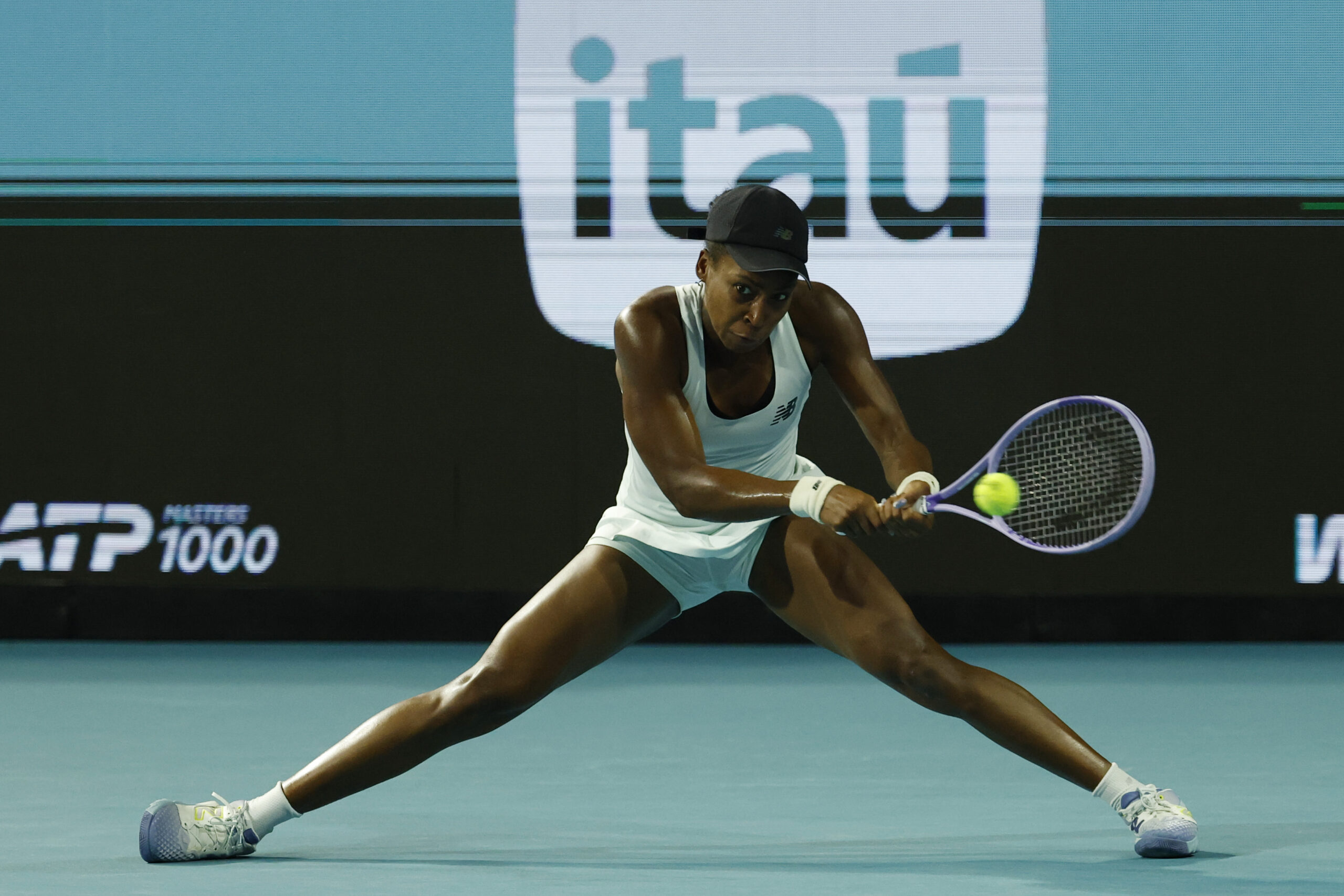 Mar 24, 2026; Miami Gardens, FL, USA; Coco Gauff (USA) hits a backhand against Belinda Bencic (SUI) (not pictured) on day eight of the 2026 Miami Open at Hard Rock Stadium. Mandatory Credit: Geoff Burke-Imagn Images