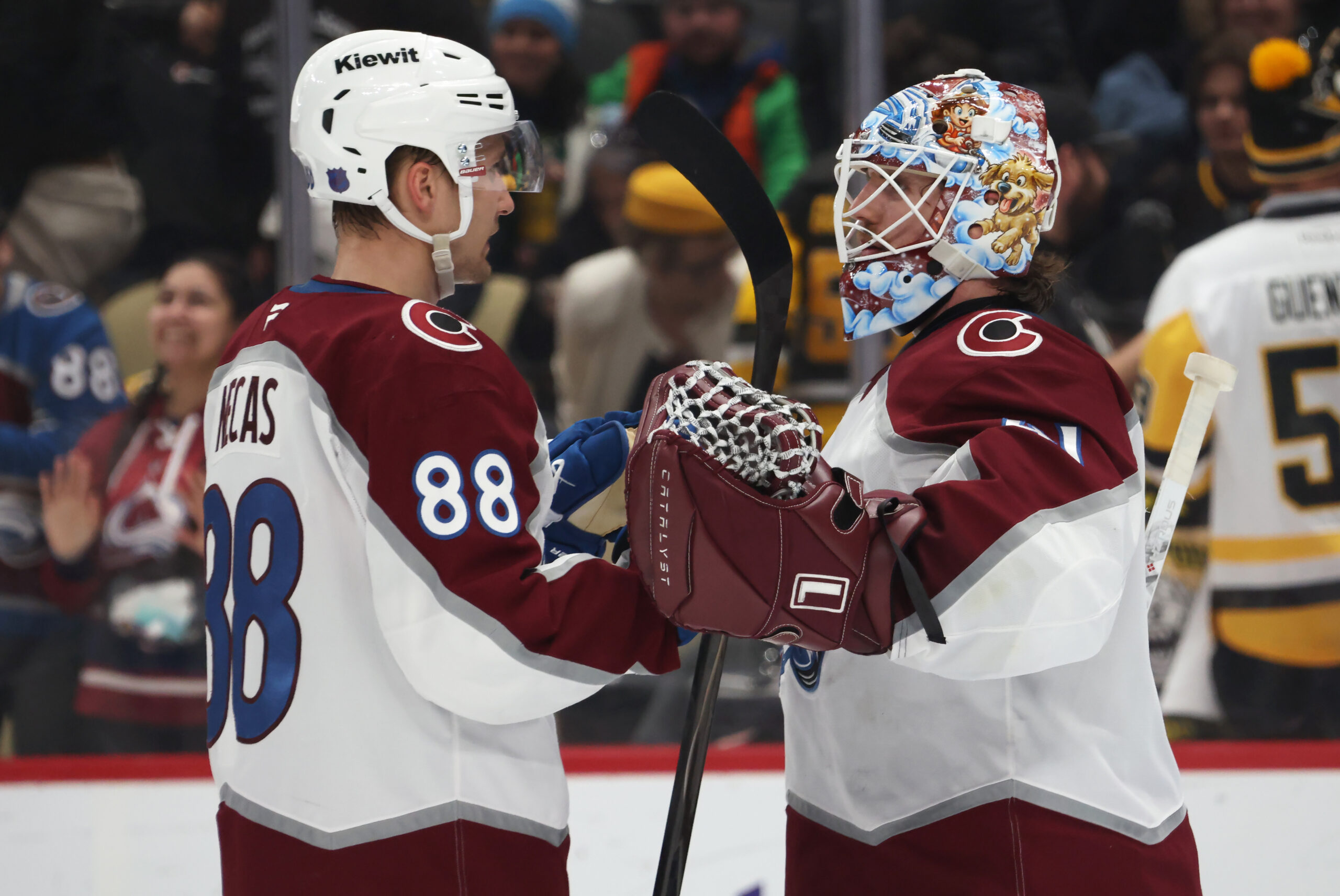 Mar 24, 2026; Pittsburgh, Pennsylvania, USA;  Colorado Avalanche center Martin Necas (88) and goaltender Scott Wedgewood (41) celebrate after defeating the Pittsburgh Penguins  at PPG Paints Arena. Mandatory Credit: Charles LeClaire-Imagn Images