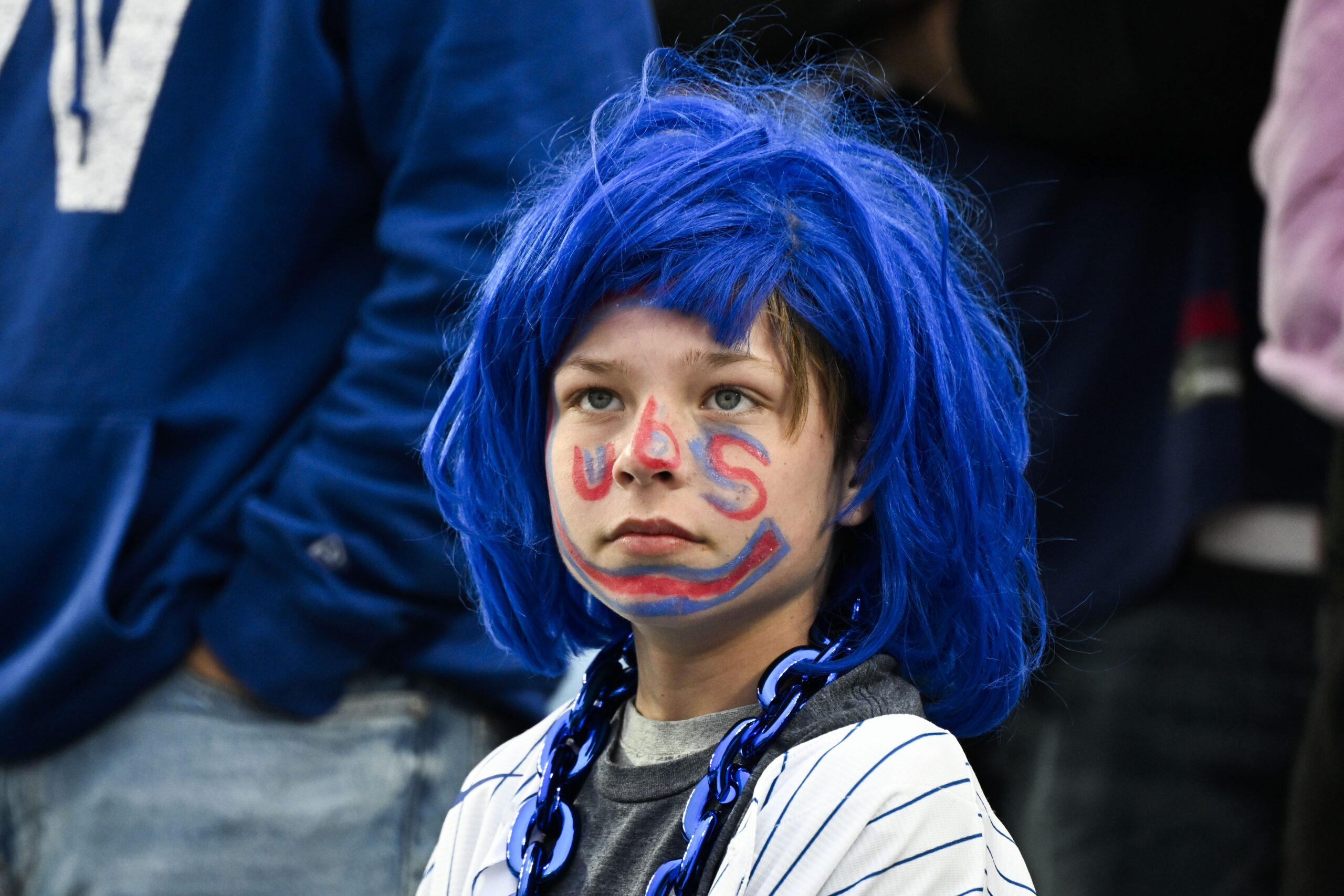 Mar 26, 2026; Chicago, Illinois, USA;  A Chicago Cubs fan during the seventh inning against the Washington Nationals at Wrigley Field. Mandatory Credit: Matt Marton-Imagn Images