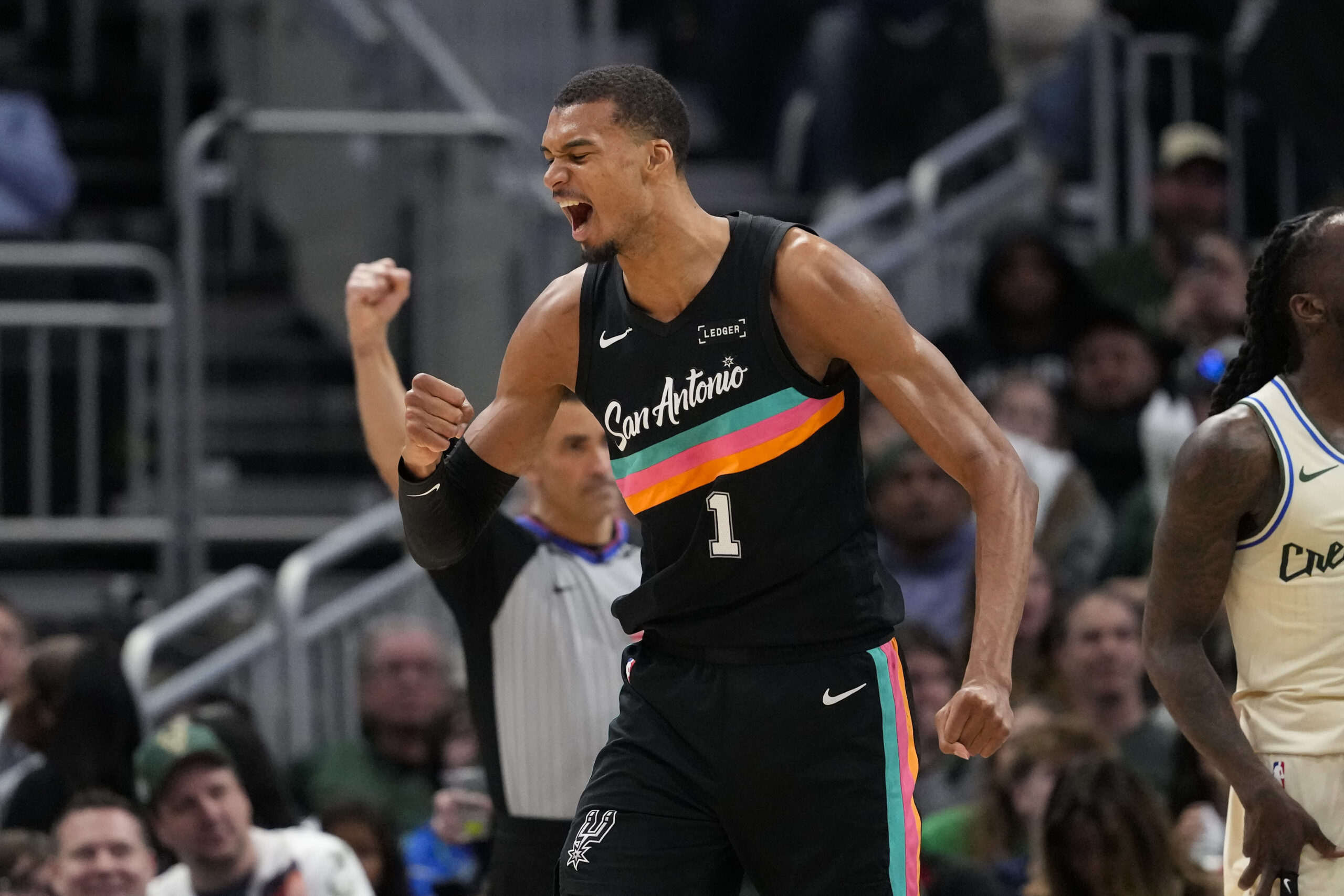 Mar 28, 2026; Milwaukee, Wisconsin, USA;  San Antonio Spurs forward Victor Wembanyama (1) celebrates after scoring a basket during the fourth quarter against the Milwaukee Bucks at Fiserv Forum. Mandatory Credit: Jeff Hanisch-Imagn Images