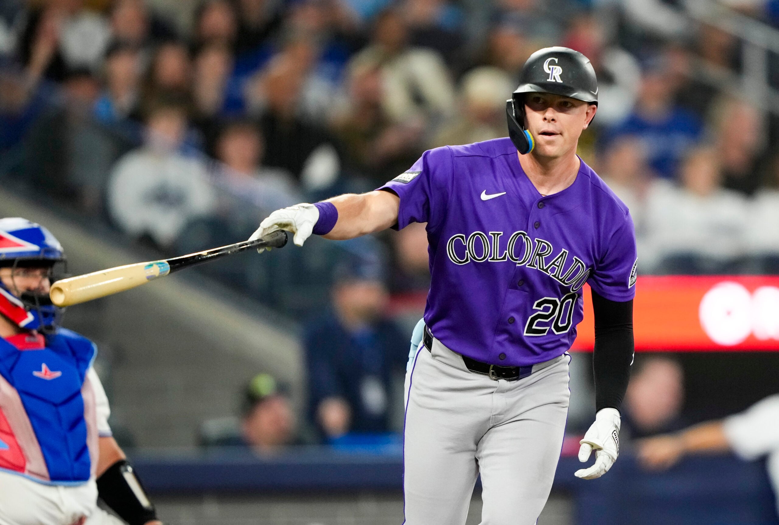 Mar 30, 2026; Toronto, Ontario, CAN;  Colorado Rockies Troy Johnston (20) hits a home rum against the Toronto Blue Jays during the sixth inning at Rogers Centre. Mandatory Credit: Kevin Sousa-Imagn Images