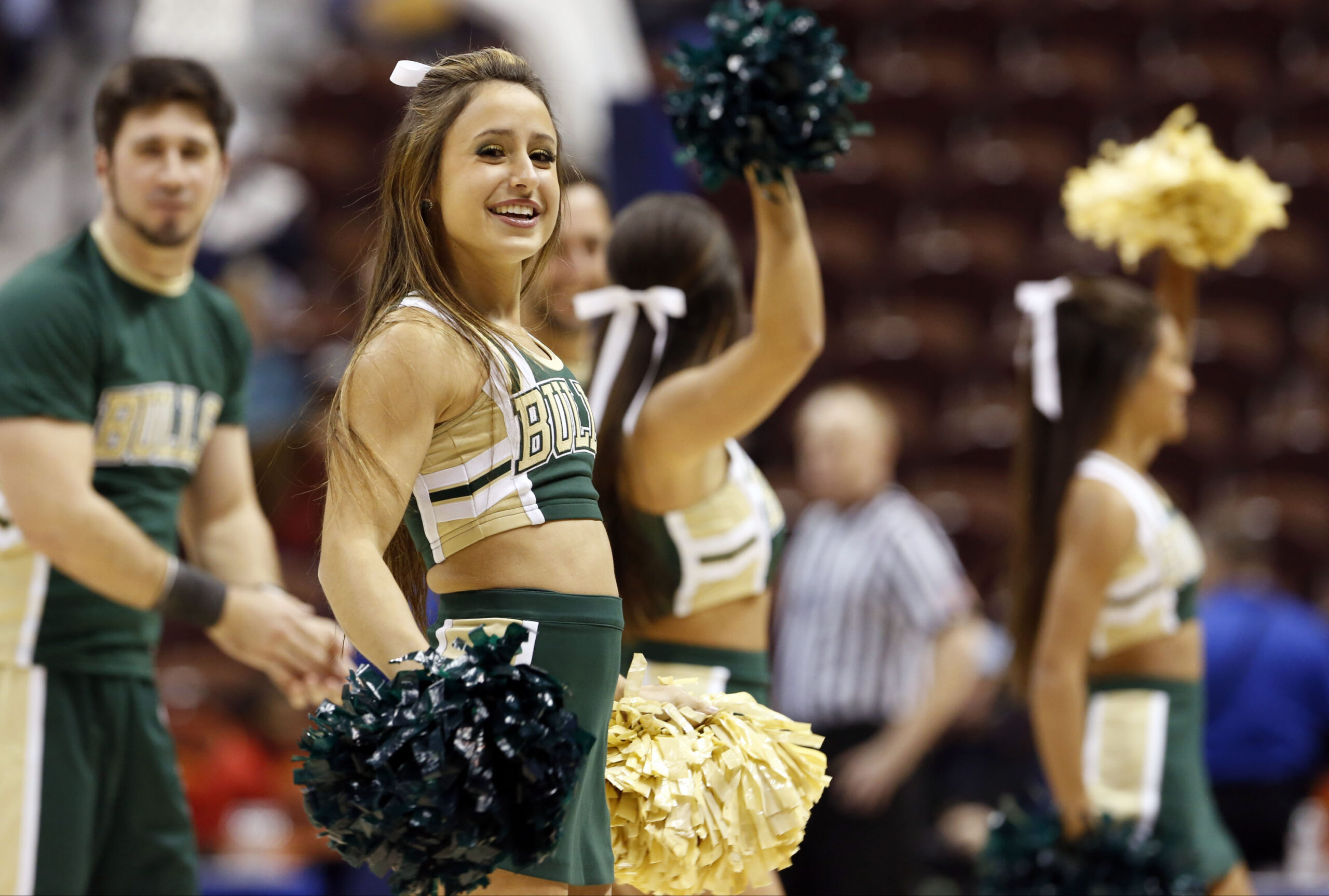 Mar 7, 2015; Uncasville, CT, USA; The South Florida Bulls cheerleaders perform during a break in the action against the Memphis Lady Tigers in the second half during the quarterfinal round of the American Conference Tournament at Mohegan Sun Arena. USF defeated Memphis 79-51. Mandatory Credit: David Butler II-Imagn Images